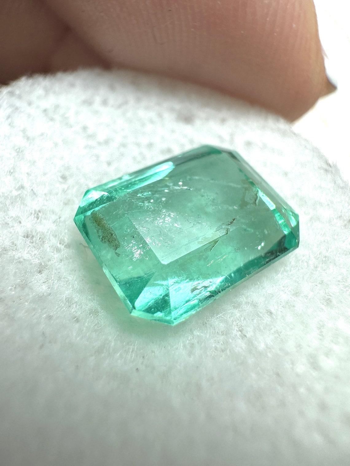 Stone: Emerald
Weight: 3.69-carats
Shape: Emerald Cut
Clarity: Transparent
Luster: Very Good
Color: Light Green
Measurements: 10.7mm x 7.90mm
Geographic Origin: Colombia
Treatment: Natural, Oiling

Comments: Due to their growth conditions in nature