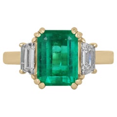 3.69tcw AAA Grade Emerald & Trapezoid Three Stone Ring Yellow Gold 18K