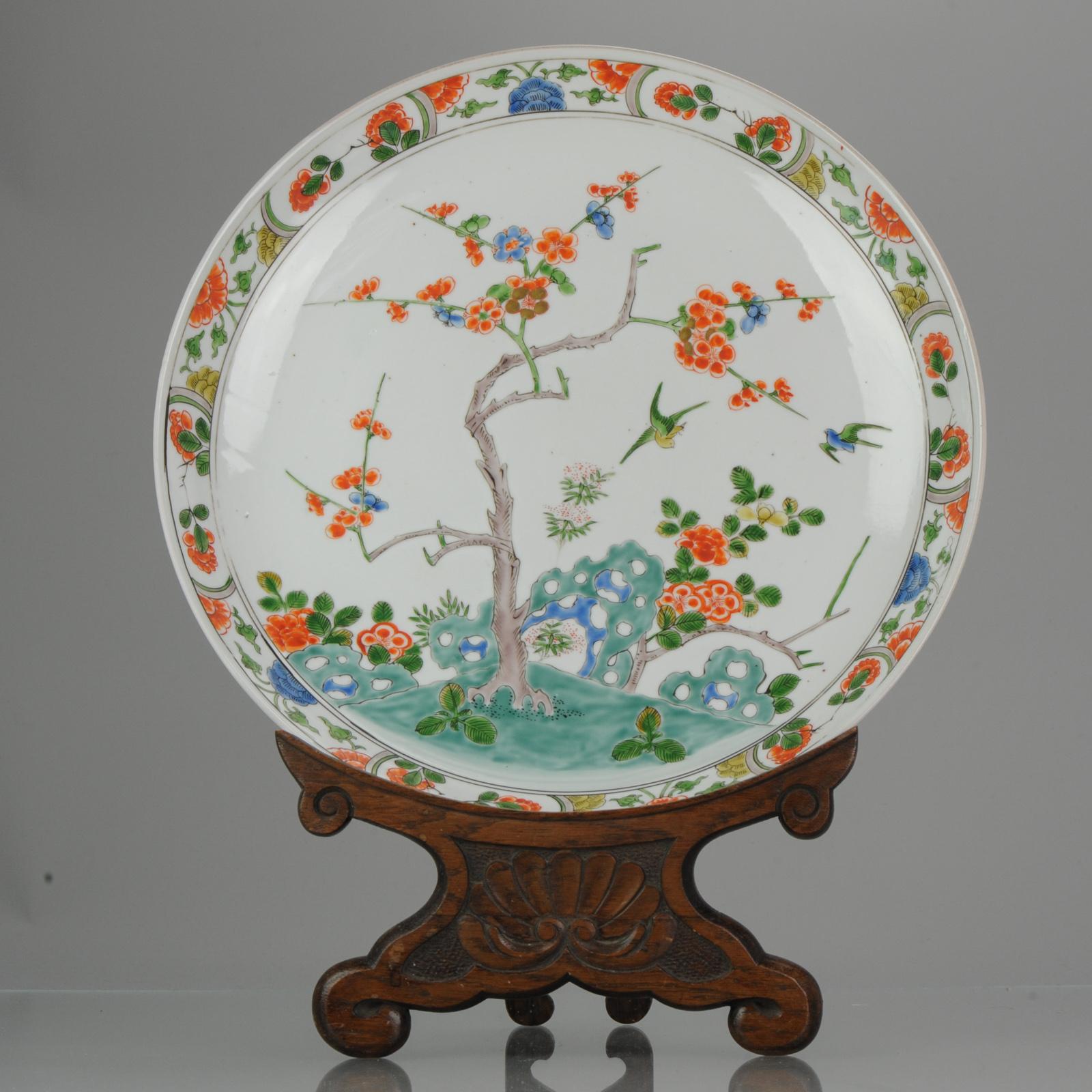 Kakiemon style large charger of Edo to early Meiji Period. Painted in the style of Early edo period Kakiemon dishes with the magpie birds and prunus trees.
The plate has two small drilled holes to the rim for hanging it up to a wall.
Condition is