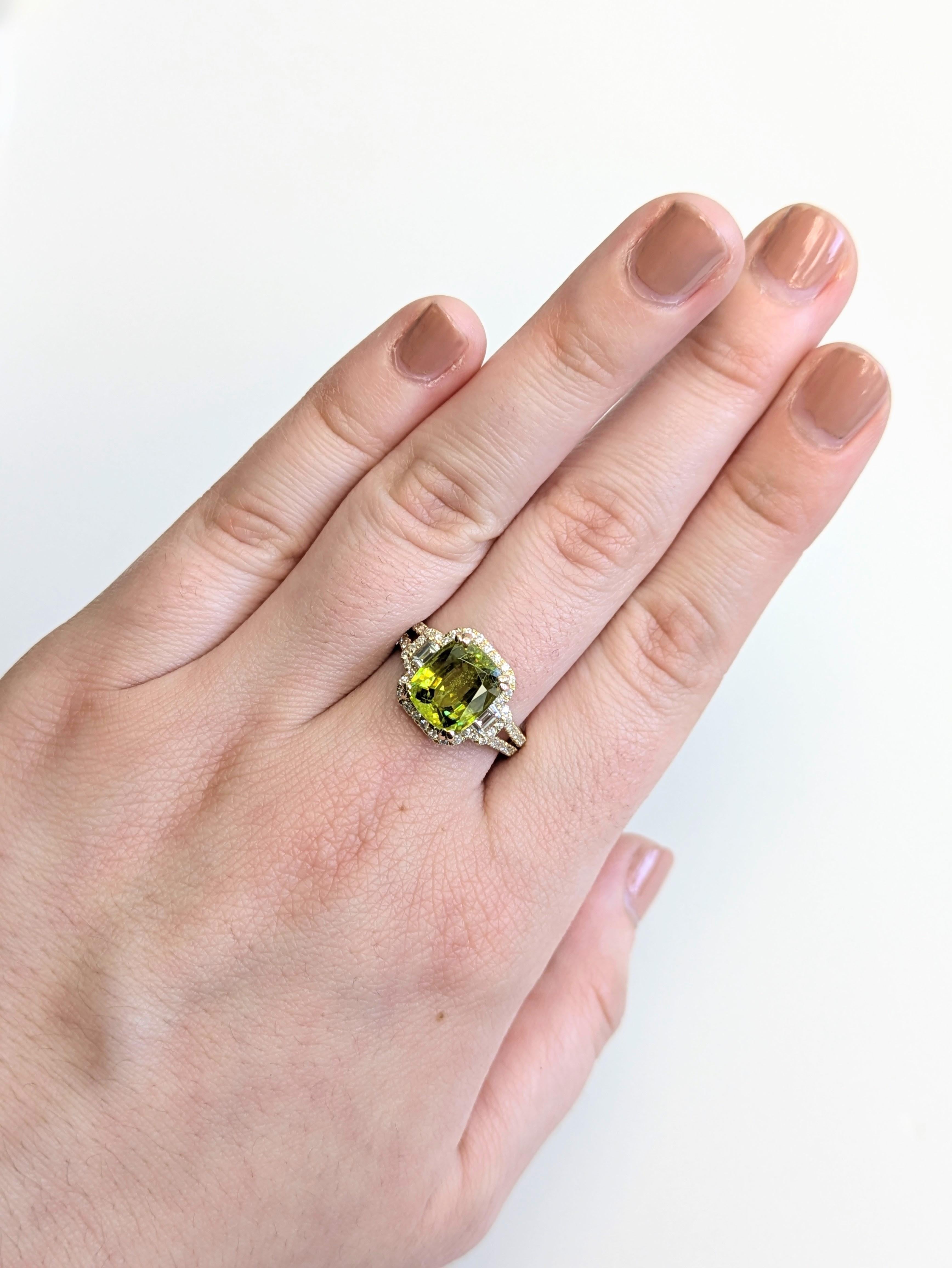 Make a bold impression with this striking 3.63 carat cushion-cut sphene ring, set in solid 14k real gold. Brilliant earth-mined diamonds frame the fiery gemstone, creating a one-of-a-kind statement ring bursting with color and sparkle.

**We offer