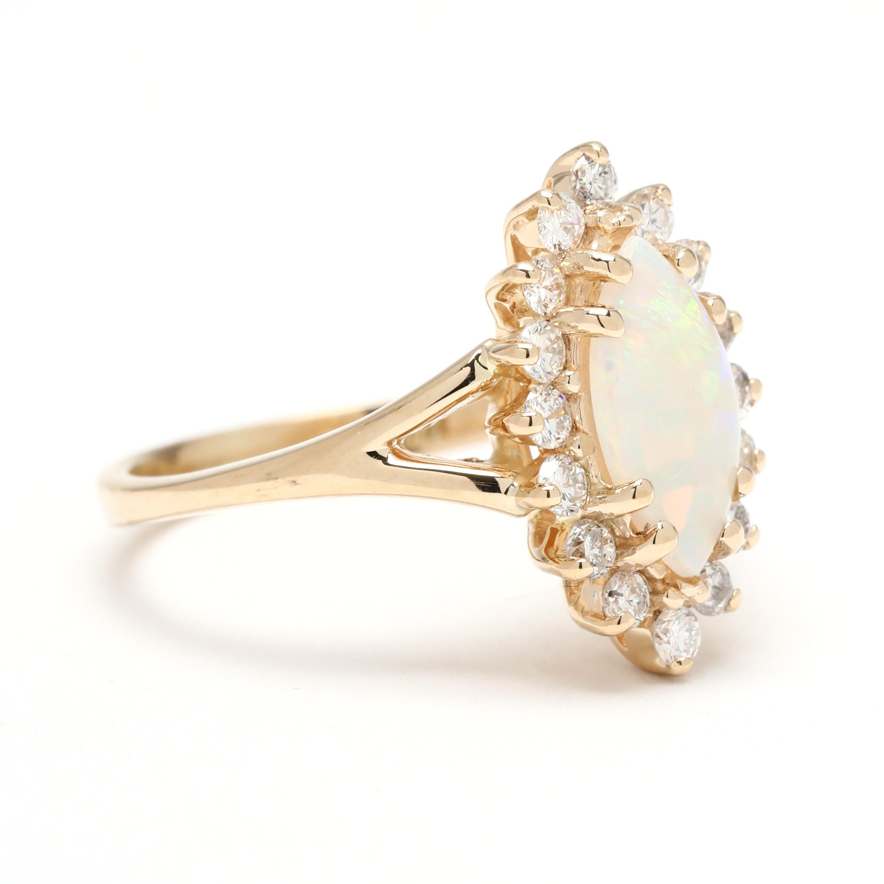 Pierres :
opale, 1 pierre
cabochon marquise
10 x 5 mm
diamants, 16 pierres
taille ronde brillante
1,75 - 1,9 mm
environ .36 carats au total
Couleur H - I, pureté SI1-I1

Taille de bague 5

Hauteur du doigt : 5.8 mm

Longueur : 16 mm

Poids : 2,1