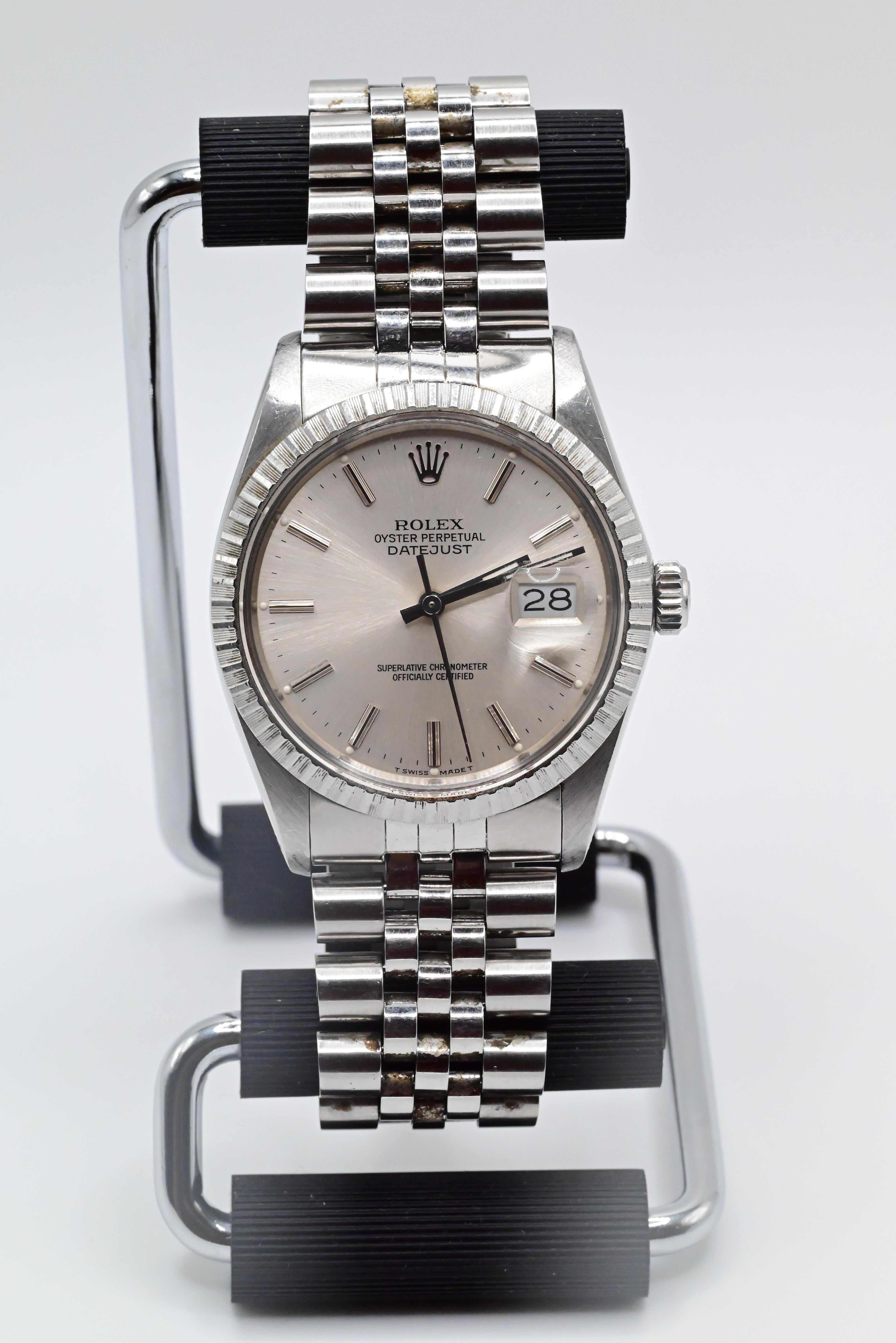 Rolex Wristwatch with Silver Dial 1602 Model
Model Datejust 
36MM Size Case
In Perfect Working Order
Has normal use ware but no damage 
Can be worn by Men or Women
No Box or Papers 
1987-1988 Model 
R66162


