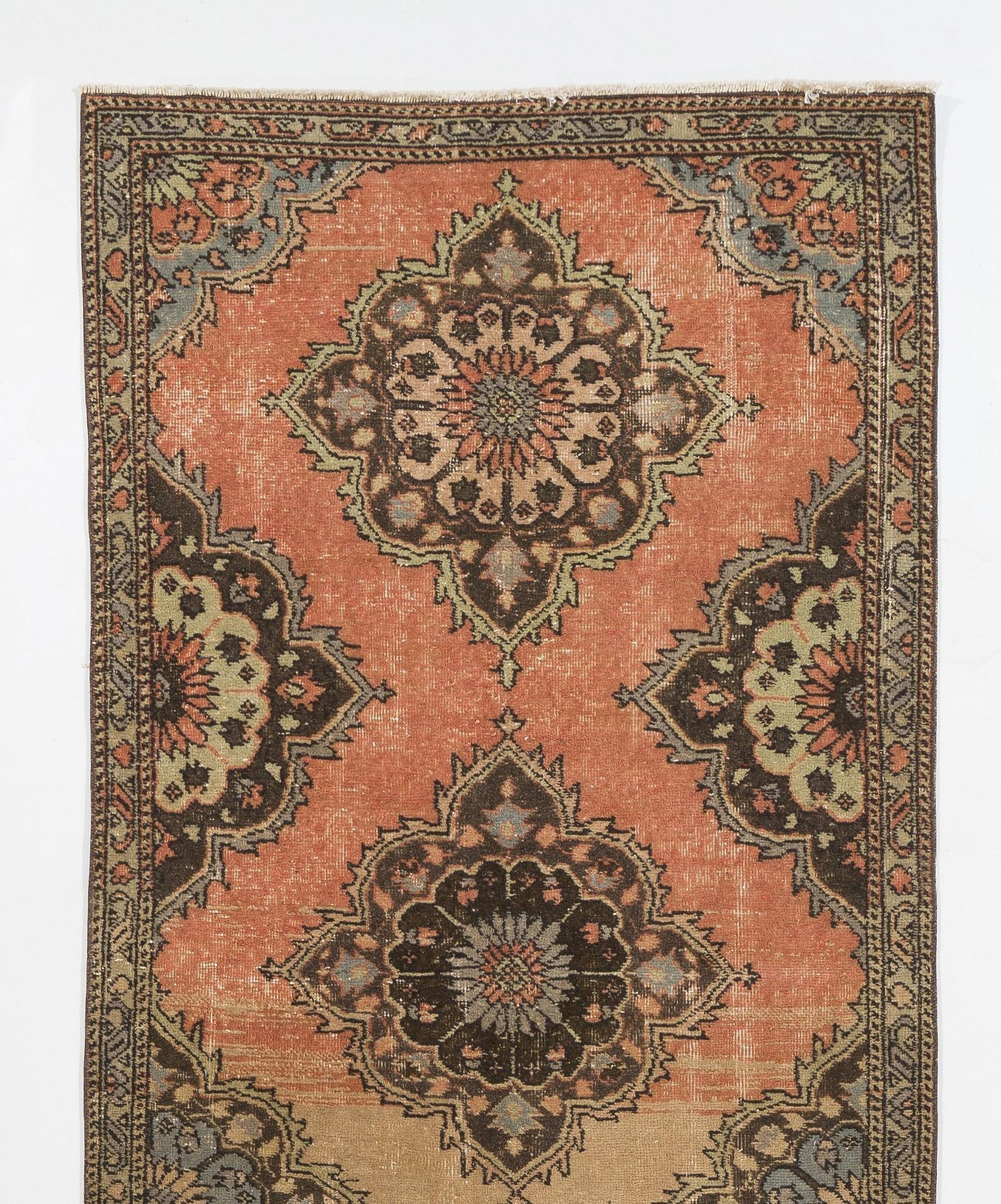 An early 20th century hand knotted runner from Central Anatolia with pleasing natural colors and wool pile on wool foundation.

Good condition, sturdy and as clean as a brand new rug. 
Measures: 3.6 x 11.7.