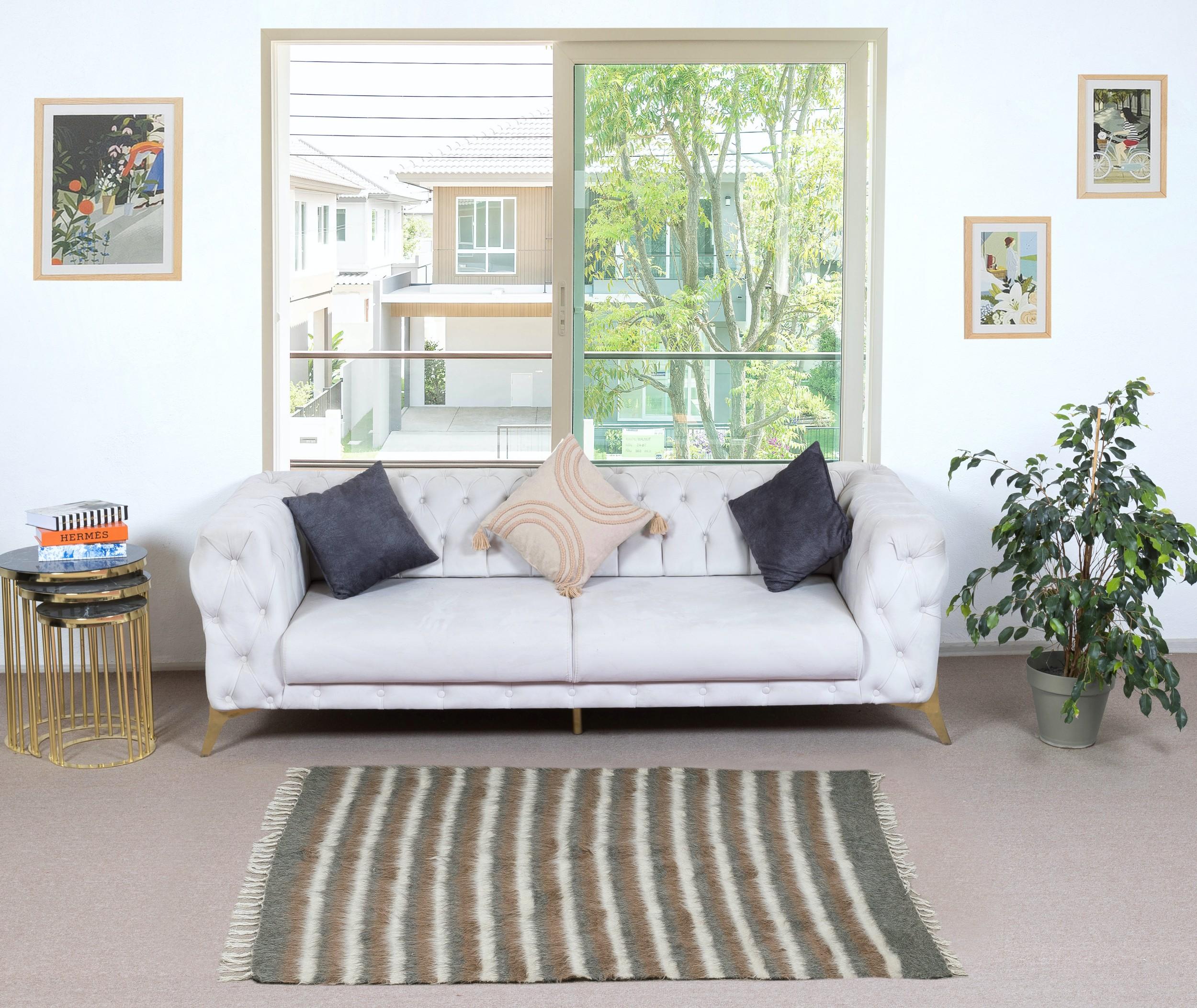 Decorative flat-weave Kurdish rug made of goat's wool, New production. Very Soft, floppy weave, ideal to use on the floor with a rug-pad or as a table cover, bed cover, wall hanging, sofa throw or blanket.

Size: 3.6 x 5.7 Ft (109 x 172 cm)
Age: