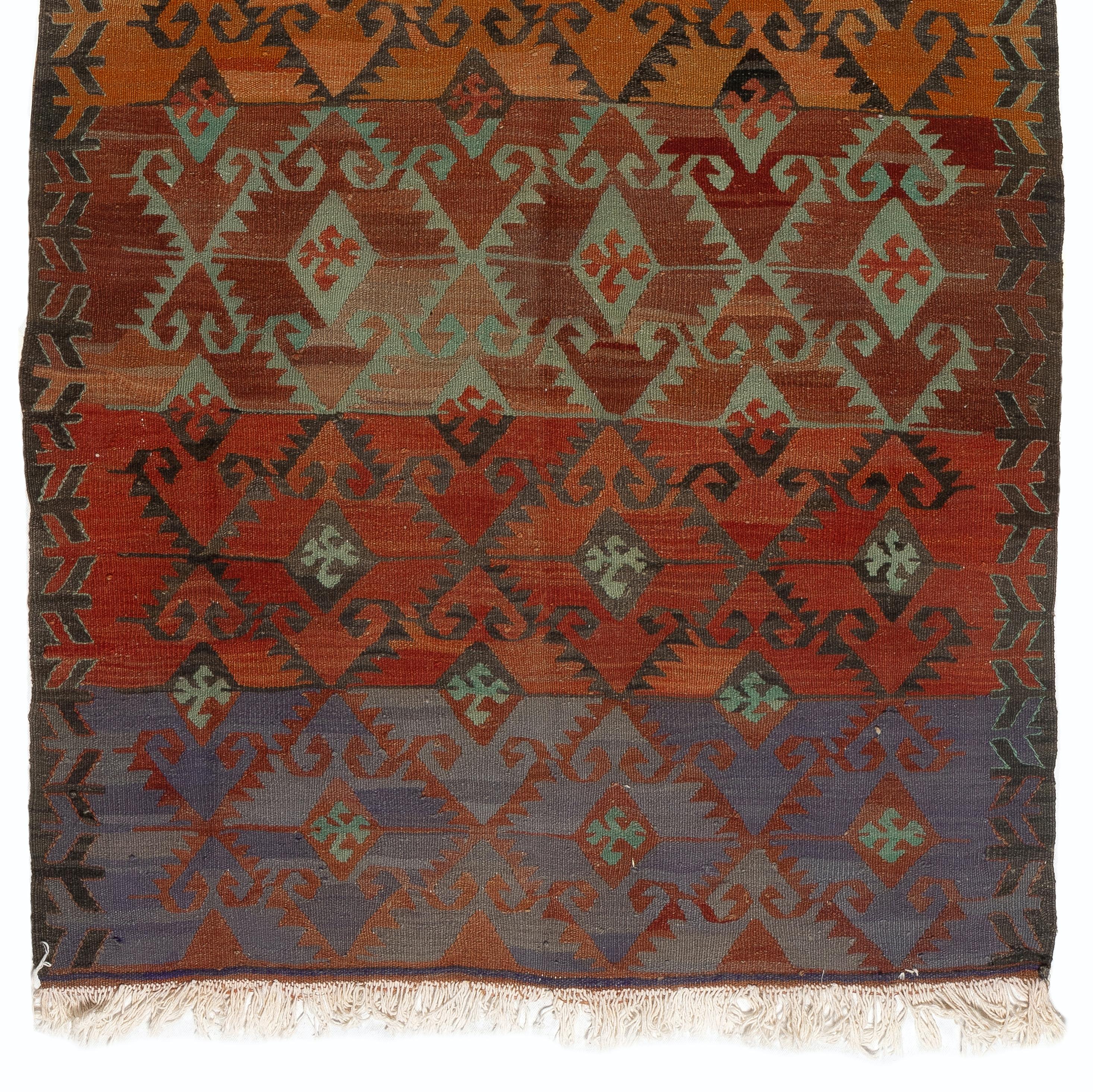Vintage handwoven flat-weave (kilim) with geometric design, all wool.
Ideal for both residencial and commercial interiors. 
We can supply a suitable rug-pad if requested for extra cushioning and protection from wear and tear. Measures: 3.6 x 7.3