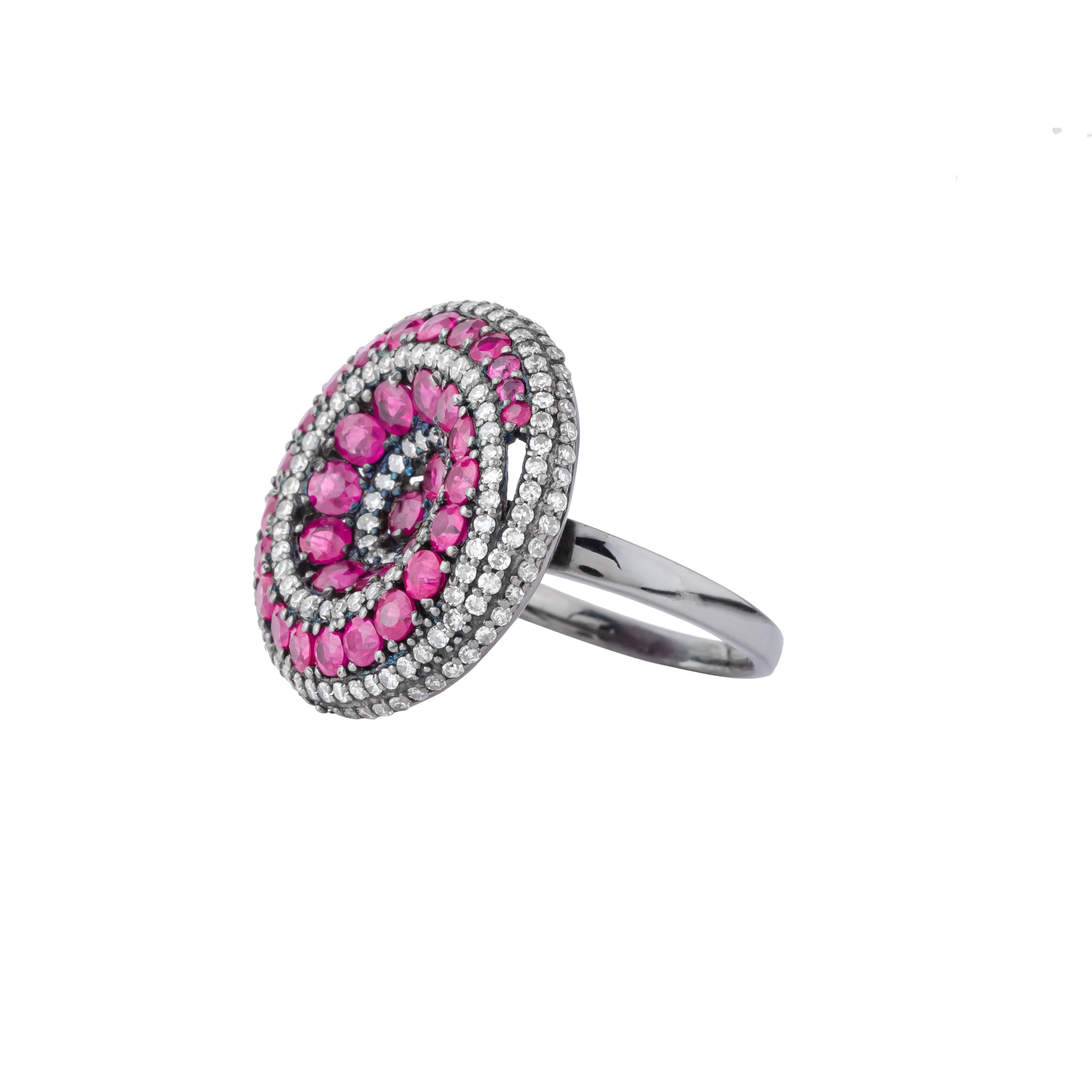The 3.7 Carat Diamond and Ruby Fashion Ring exudes a timeless elegance, perfectly blending the fiery brilliance of rubies with the scintillating sparkle of diamonds. At the heart of this exquisite piece, a vibrant ruby commands attention with its