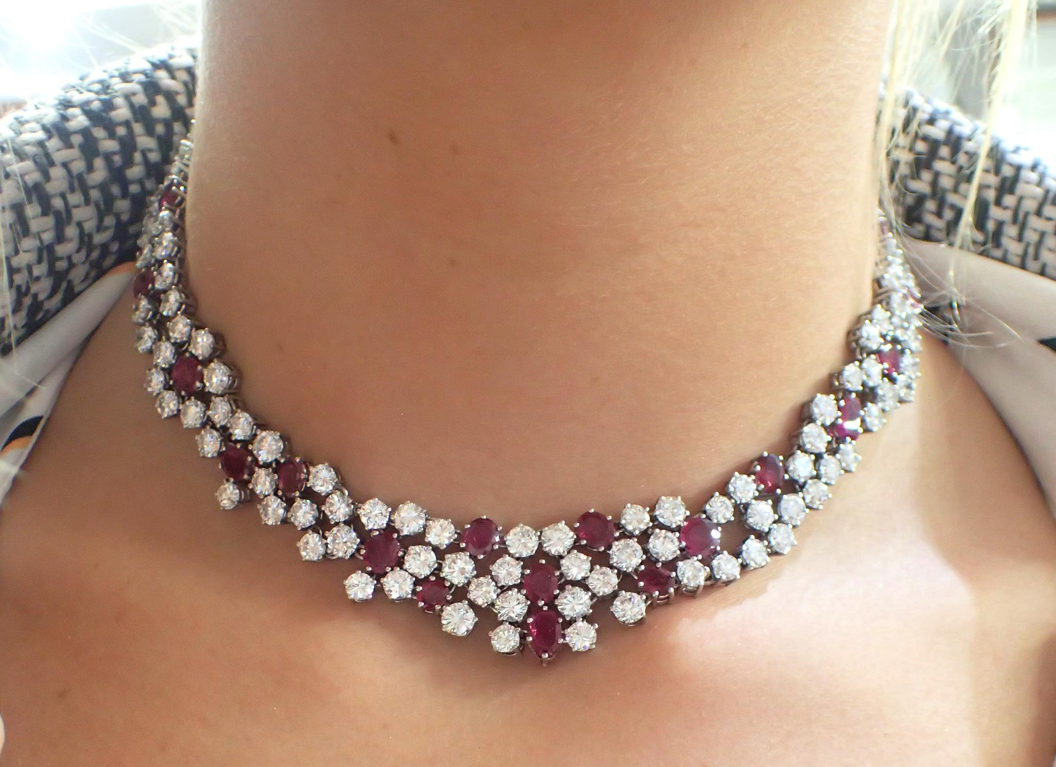 This magnificent formal necklace will be the talk of the party. Featuring 27ct of round diamonds and 10ct of rich, red rubies, this piece is a stunning example of 20th century fine workmanship. The rubies come in a multitude of shapes and are each