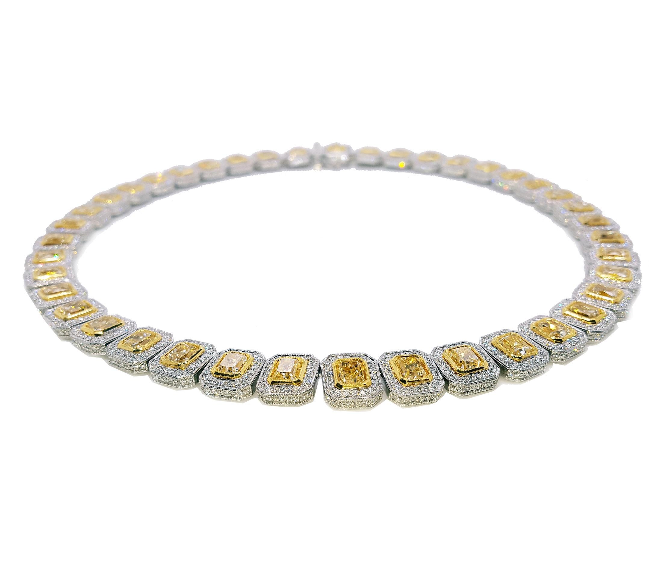 This luxurious elegant design diamond eternity necklace features just under 30 carat perfectly matched radiant cut yellow diamonds, each diamond is approximately 0.71 carat. encircled by a halo of 7.90 carat of round brilliant white diamond accents,
