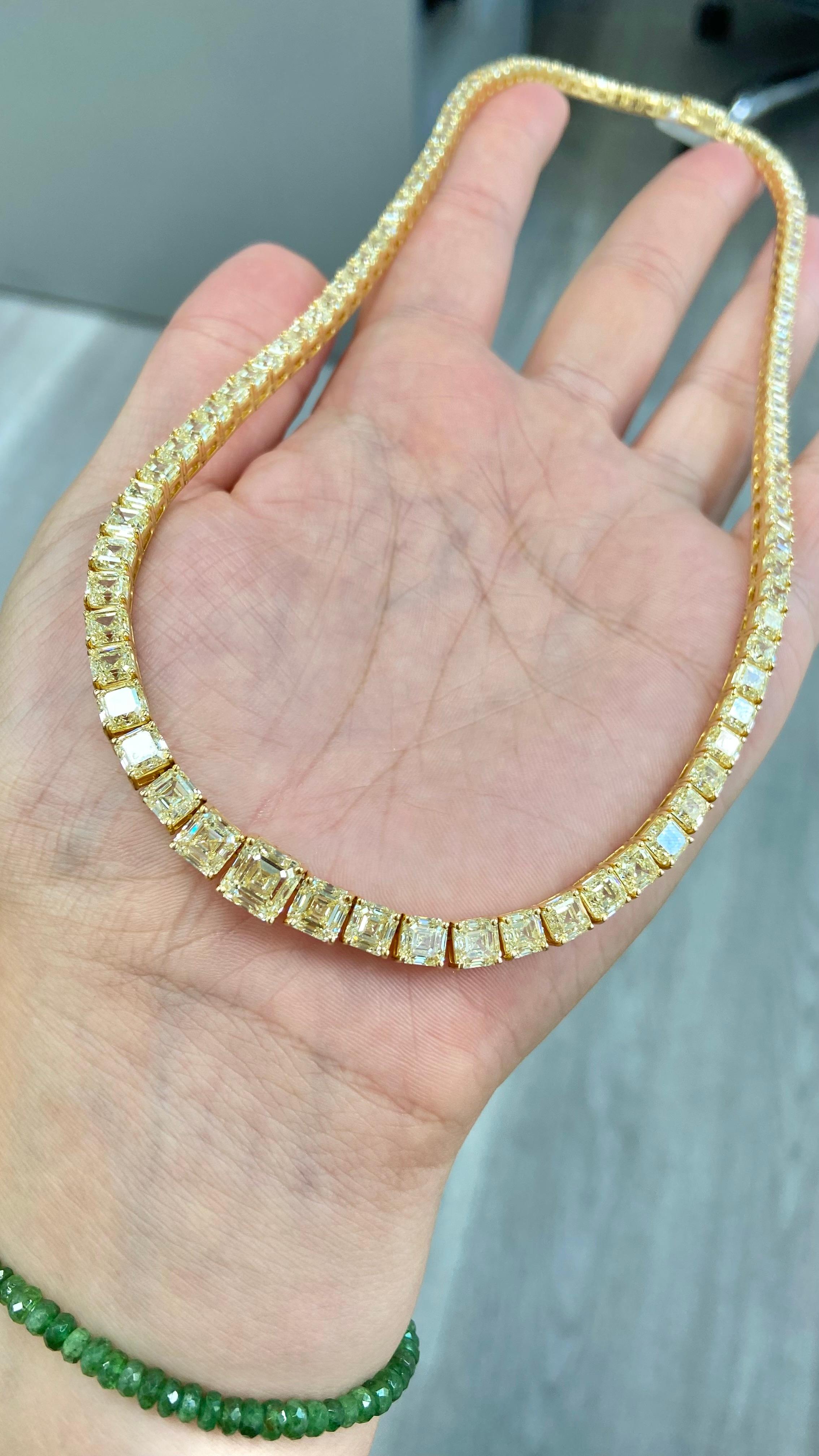Riviera Tennis Necklace - diamonds gradually increasing in size toward the front of the necklace.
37 carats total yellow diamonds asscher cut diamonds (square emerald cuts) 
Featuring a 2.00 Carat Light Yellow Asscher Cut Center VS1 Clarity in the