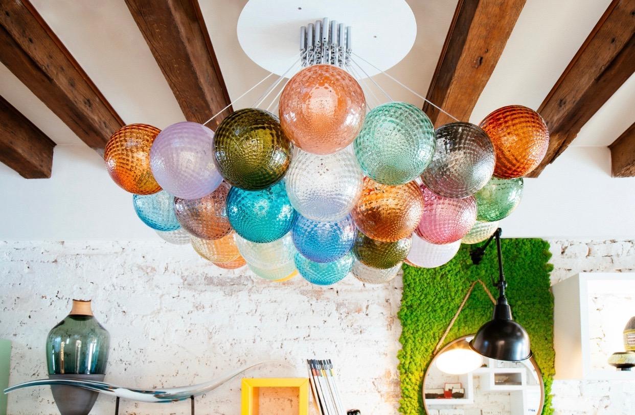 Steel 37 lights ceiling chandelier, with colored transparent Murano glass spheres For Sale