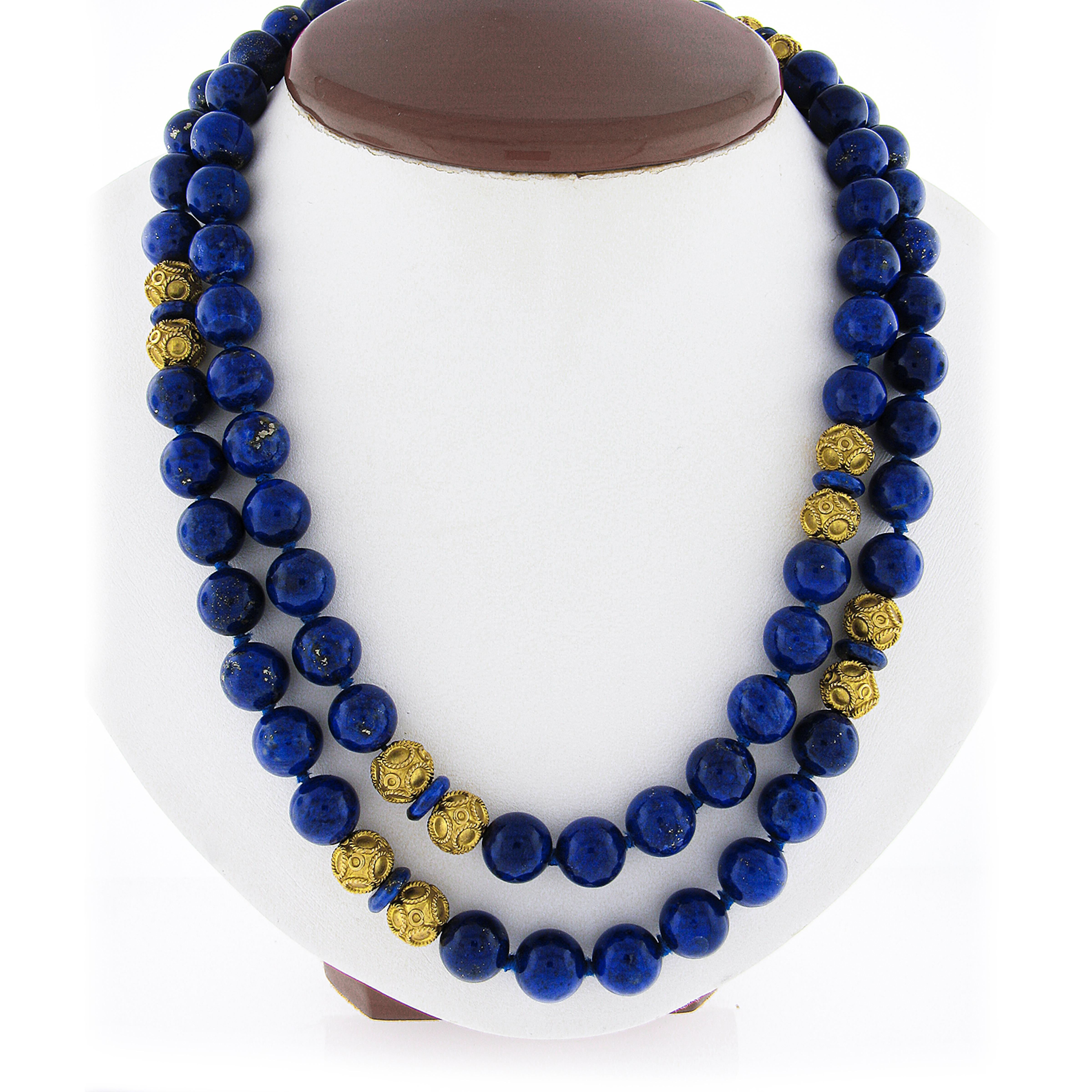 Here we have a gorgeous bead strand necklace that features 80 genuine lapis lazuli beads that are GIA certified & elegantly accented with 18k yellow gold twisted wire work bead stations throughout. The beads display beautiful vivid blue colors. The
