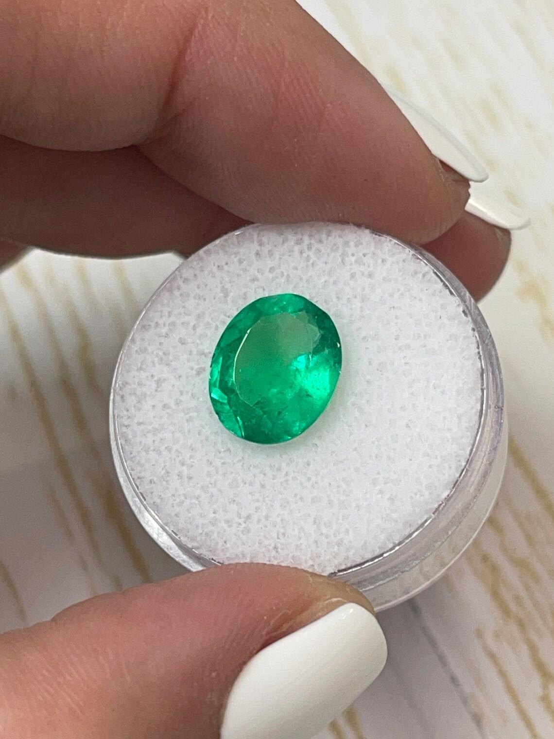 Women's 3.70 Carat 12x10 Electric Green Colombian Emerald - Oval Cut  May Birthstone For Sale