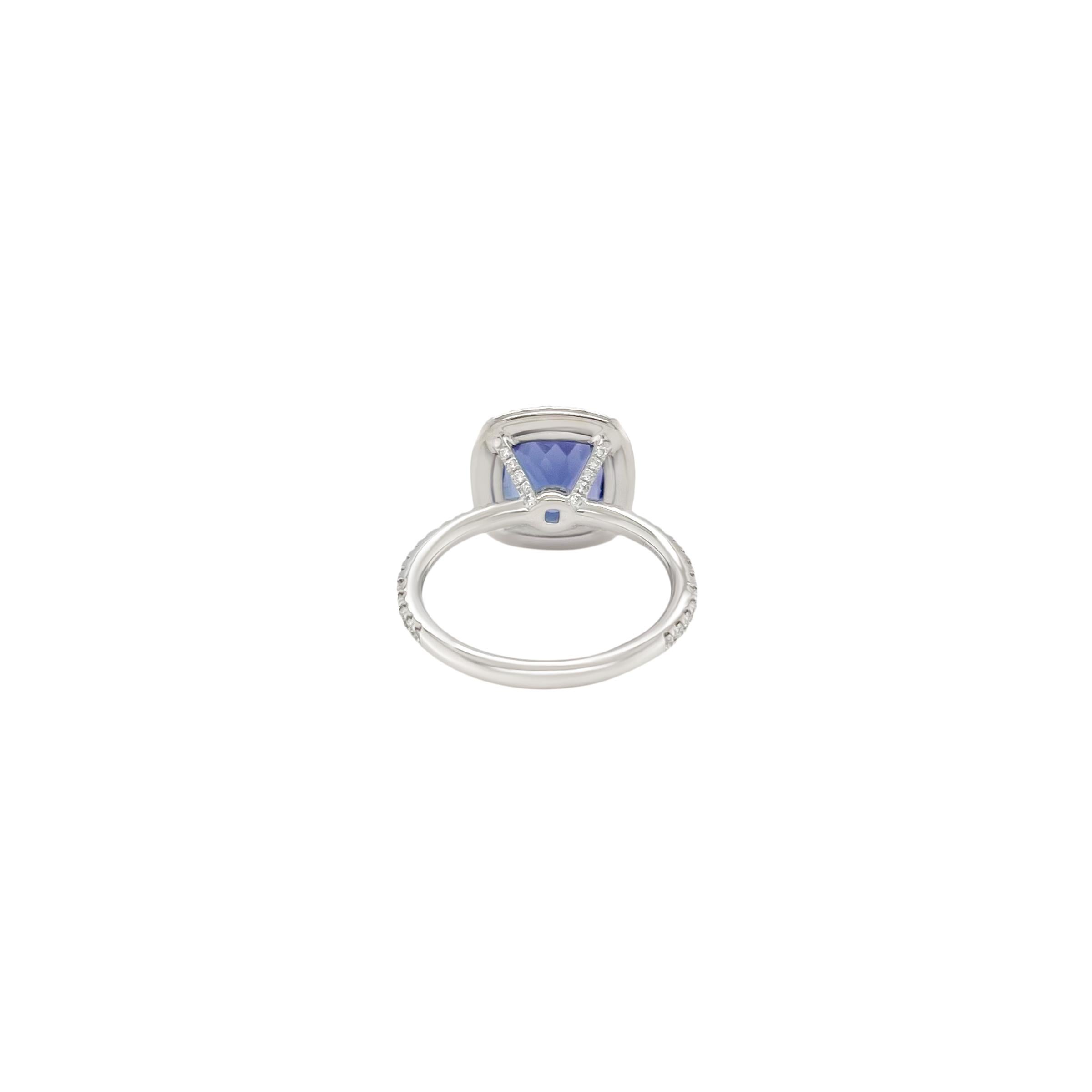 Modern 3.70 Carat Cushion Cut Tanzanite Ring with Diamond Halo Ring in 18k For Sale