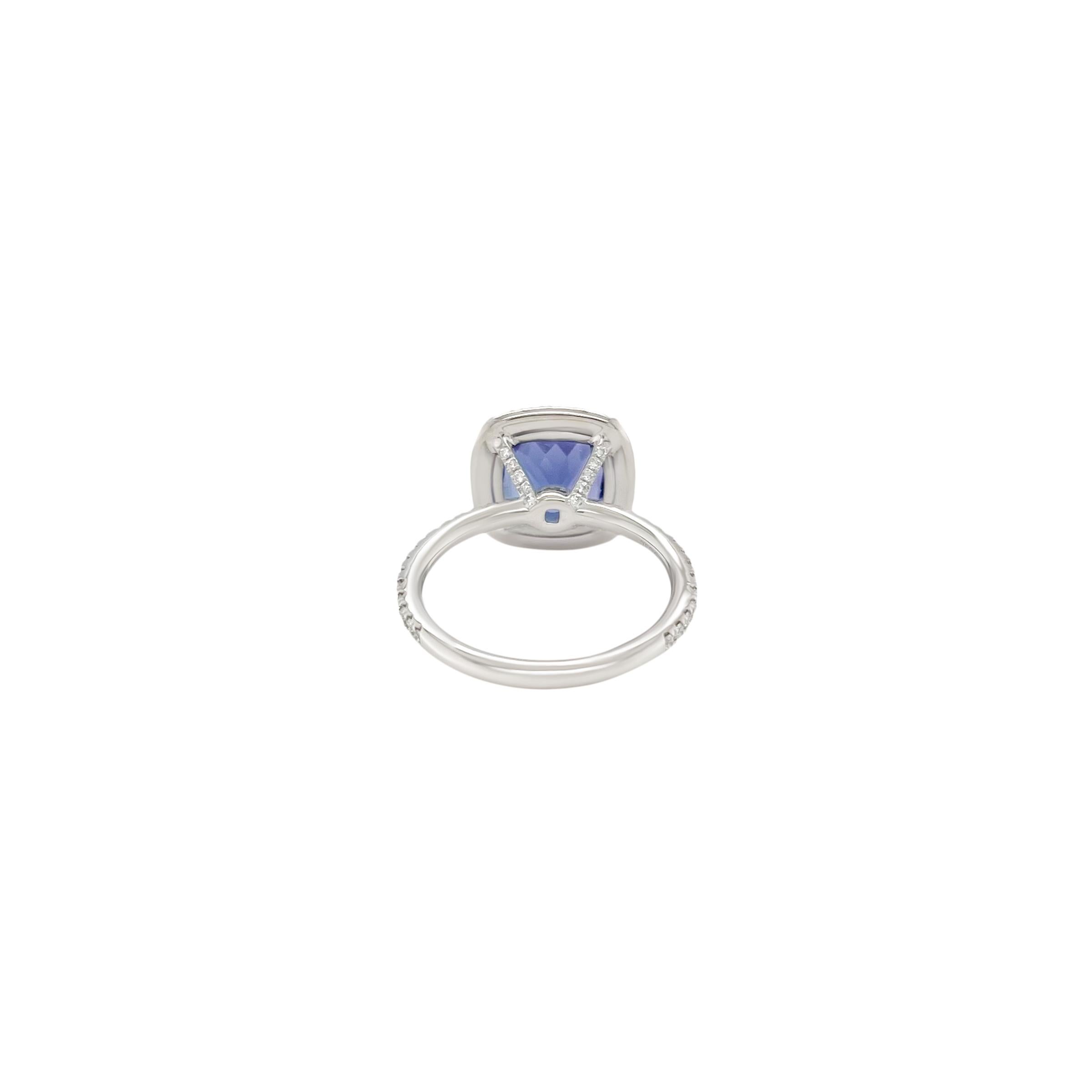 Modern 3.70 Carat Cushion Cut Tanzanite and Diamond Halo Ring in 18k For Sale