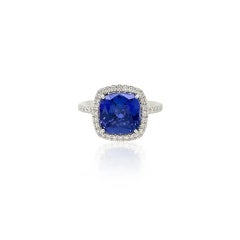 3.70 Carat Cushion Cut Tanzanite and Diamond Halo Ring in 18k