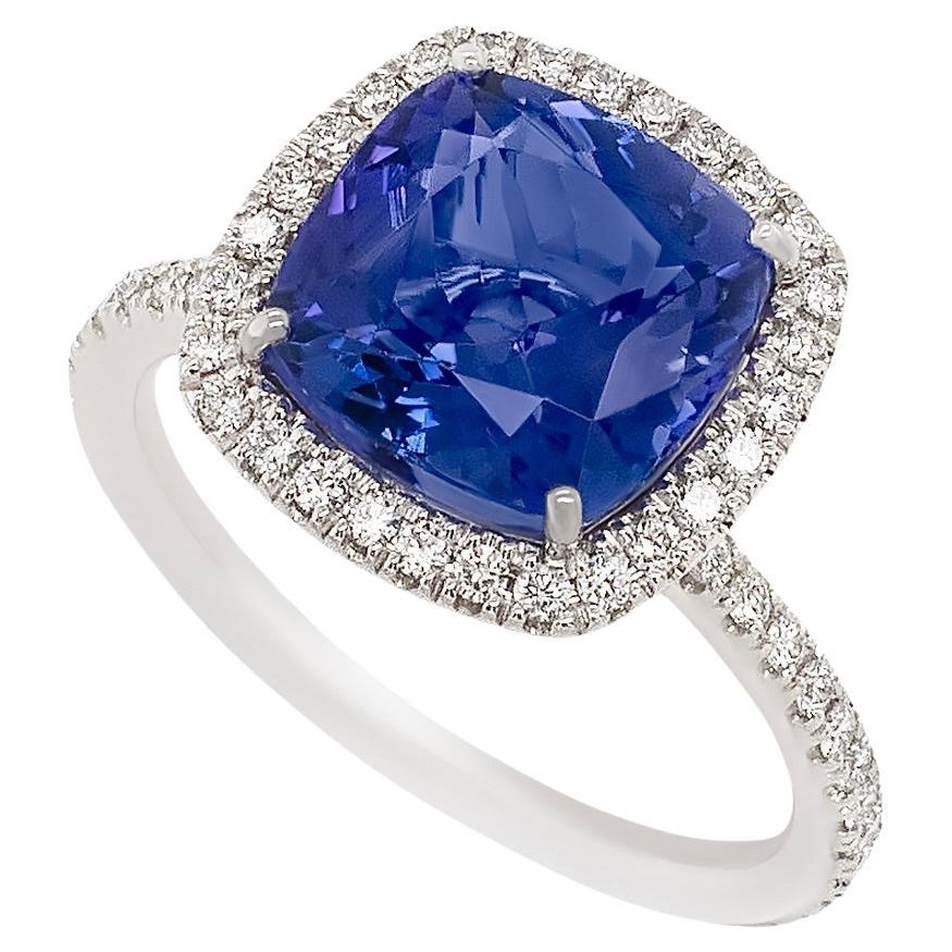 Bague en or 18 carats avec tanzanite taille coussin de 3,70 carats et halo de diamants