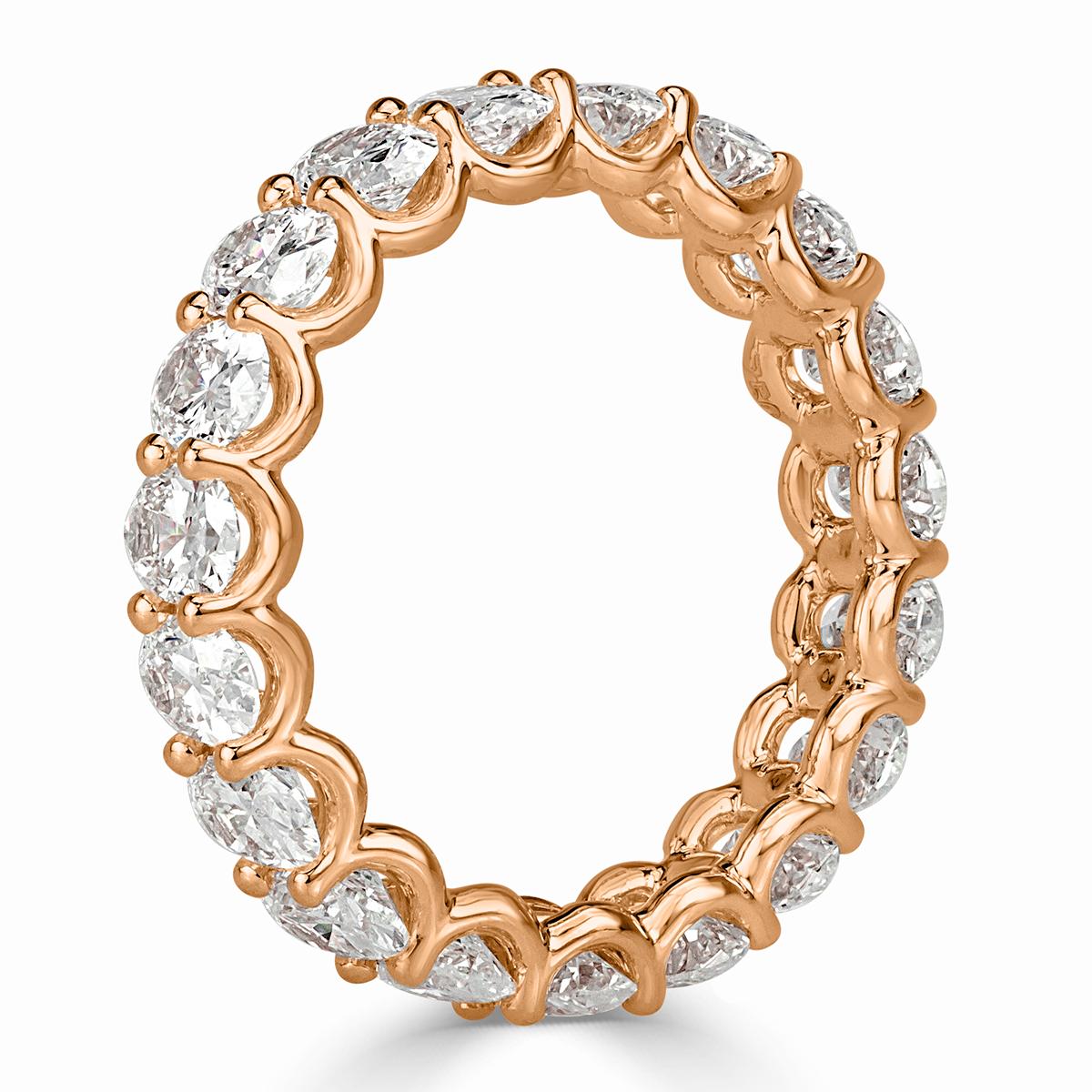 Handcrafted in an 18k rose gold, this divine diamond eternity band showcases 3.70ct of oval cut diamonds graded at E-F, VS1-VS2. The diamonds are set in a 