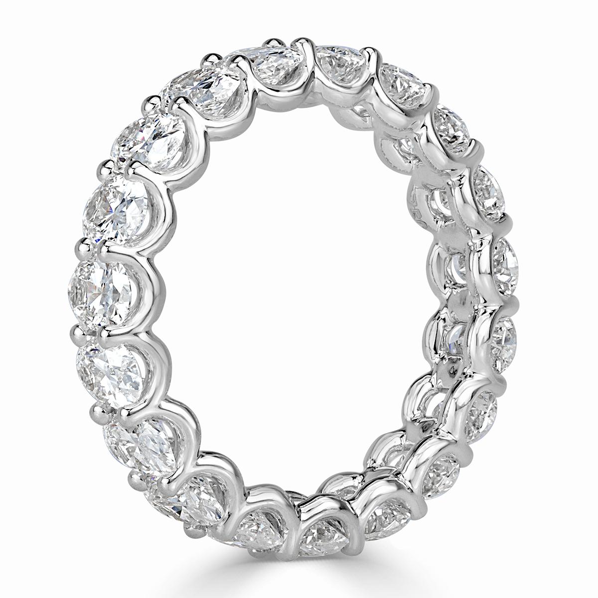 This stunning diamond eternity band showcases 3.70ct of oval cut diamonds hand set in 18k white gold. The diamonds are matched and graded at E-F, VS1-VS2. All eternity bands are shown in a size 6.5. We custom craft each eternity band and will create