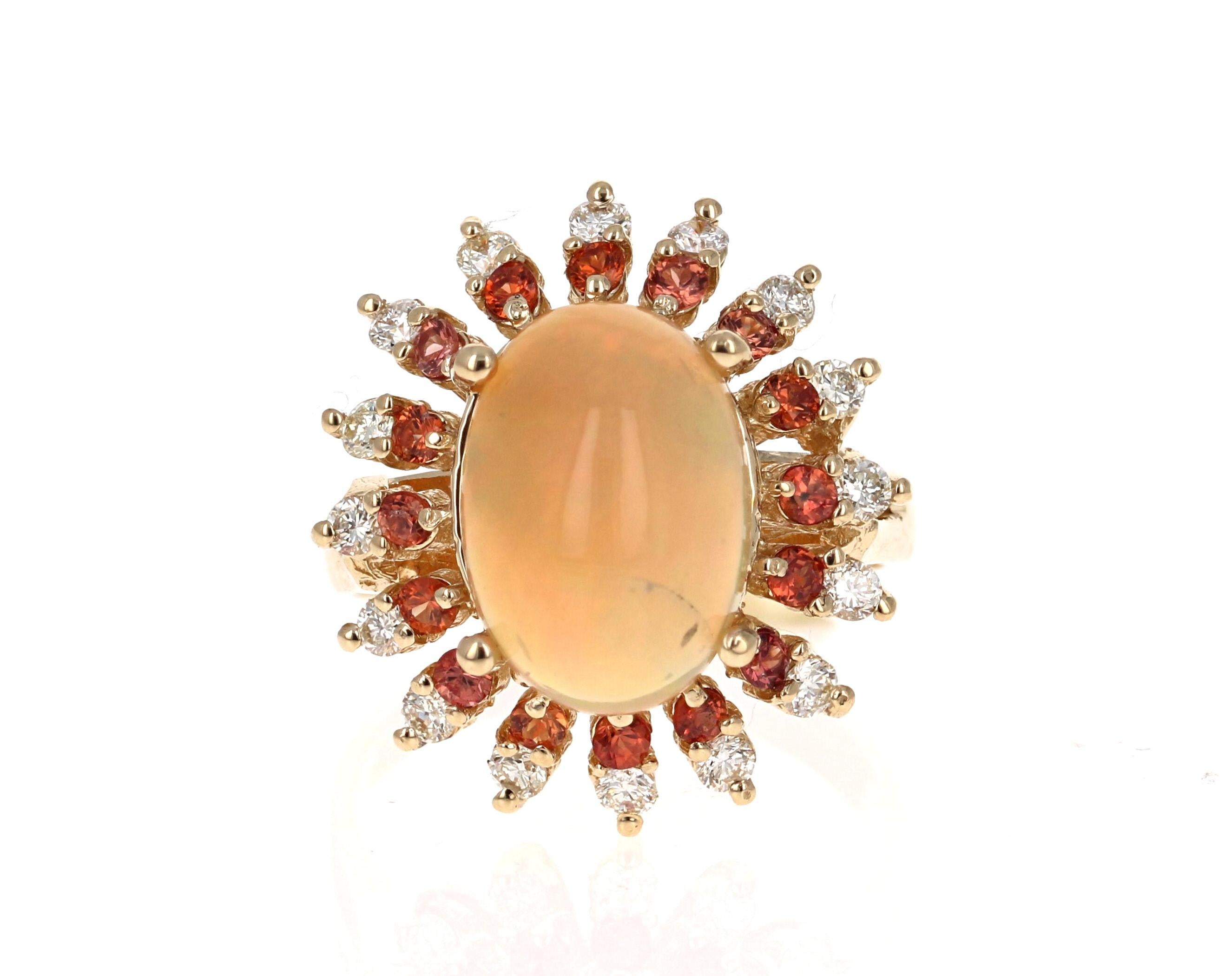 Stunning and uniquely designed 6.63 Carat Oval Cut Opal and Diamond Yellow Gold Ring with Orange Sapphire accents!

The Oval Cut Opal in the center of the ring weighs 2.68 Carats.  It is surrounded by 16 Round Cut Orange Sapphires that weigh 0.53
