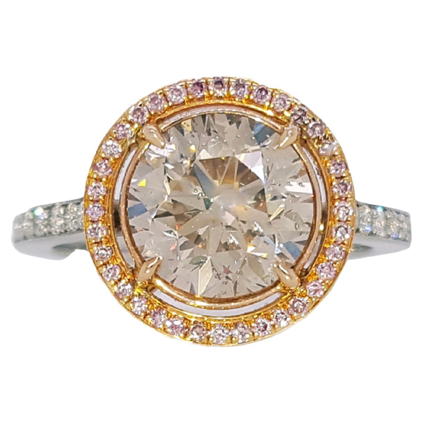 3.70 Carat Round Cut Brown, Pink And White Diamond, Engagement Ring in Platinum.