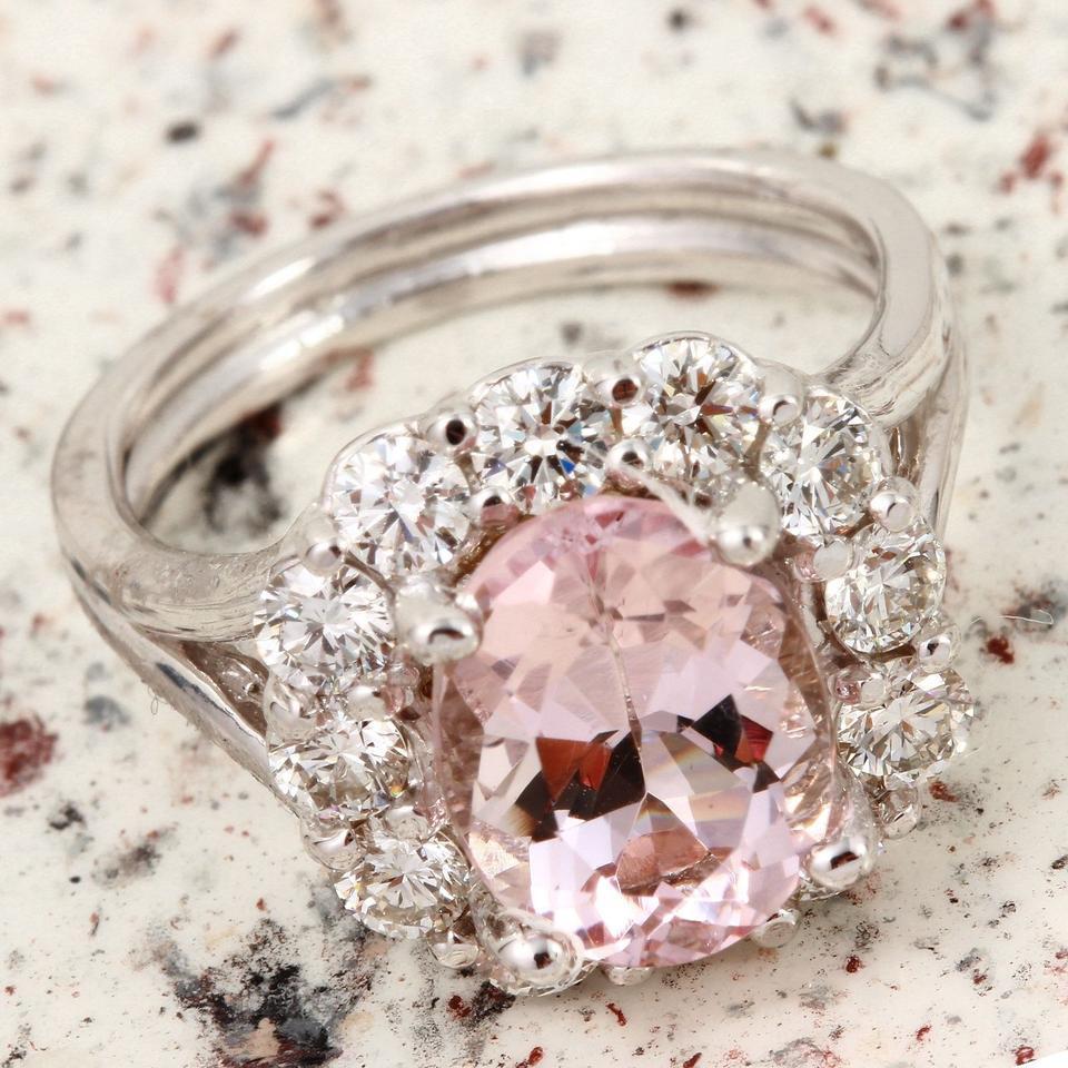 3.70 Carats Exquisite Natural Morganite and Diamond 14K Solid White Gold Ring

Total Natural Morganite Weight: Approx. 2.35 Carats

Morganite Measures: Approx. 10.00 x 8.00mm

Natural Round Diamonds Weight: Approx. 1.35 Carats (color G-H / Clarity