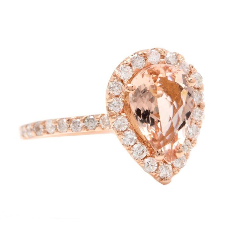 3.70 Carats Exquisite Natural Morganite and Diamond 18K Solid Rose Gold Ring

Total Natural Pear Shaped Morganite Weights: Approx. 3.00 Carats

Morganite Measures: Approx. 10.00 x 7.00mm

Morganite Treatment: Heat

Natural Round Diamonds Weight: