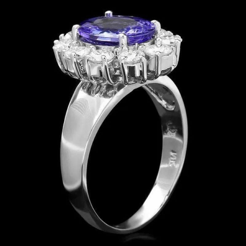 3.70 Carats Natural Tanzanite and Diamond 14K Solid White Gold Ring

Total Natural Tanzanite Weight is: Approx. 2.50 Carats 

Tanzanite Measures: Approx. 10.00 x 8.00mm

Natural Round Diamonds Weight: Approx. 1.20 Carats (color G-H / Clarity