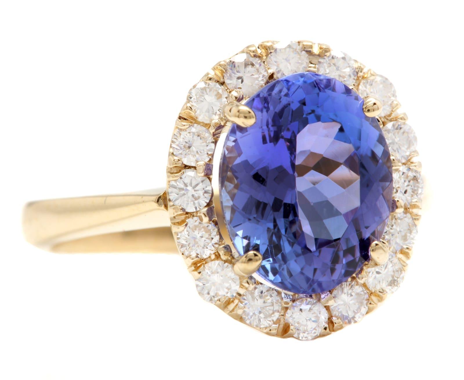 3.70 Carats Natural Very Nice Looking Tanzanite and Diamond 14K Solid Yellow Gold Ring

Suggested Replacement Value:  $6,000.00

Total Natural Oval Cut Tanzanite Weight is: Approx. 3.10 Carats 

Tanzanite Measures: Approx. 10.00 x 8.00mm
 
Natural