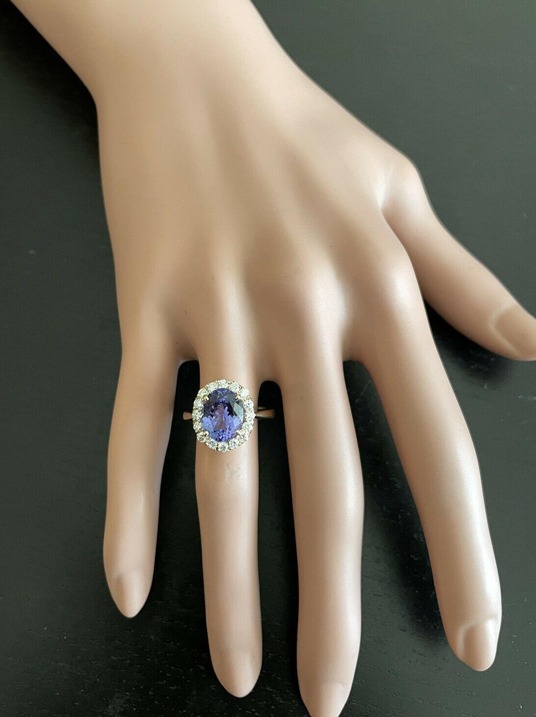 Women's 3.70 Carats Natural Tanzanite and Diamond 14k Solid Yellow Gold Ring For Sale