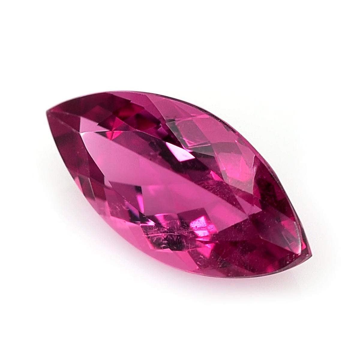 Identification: Natural Rubellite 3.70 carats

Carat: 3.70 carats
Shape: Marquise
Measurements: 15.08 x 7.7 mm
Cut: Brilliant/Step
Color: Pink
Clarity: very eye clean

Introducing a captivating Natural Rubellite, weighing 3.70 carats and skillfully