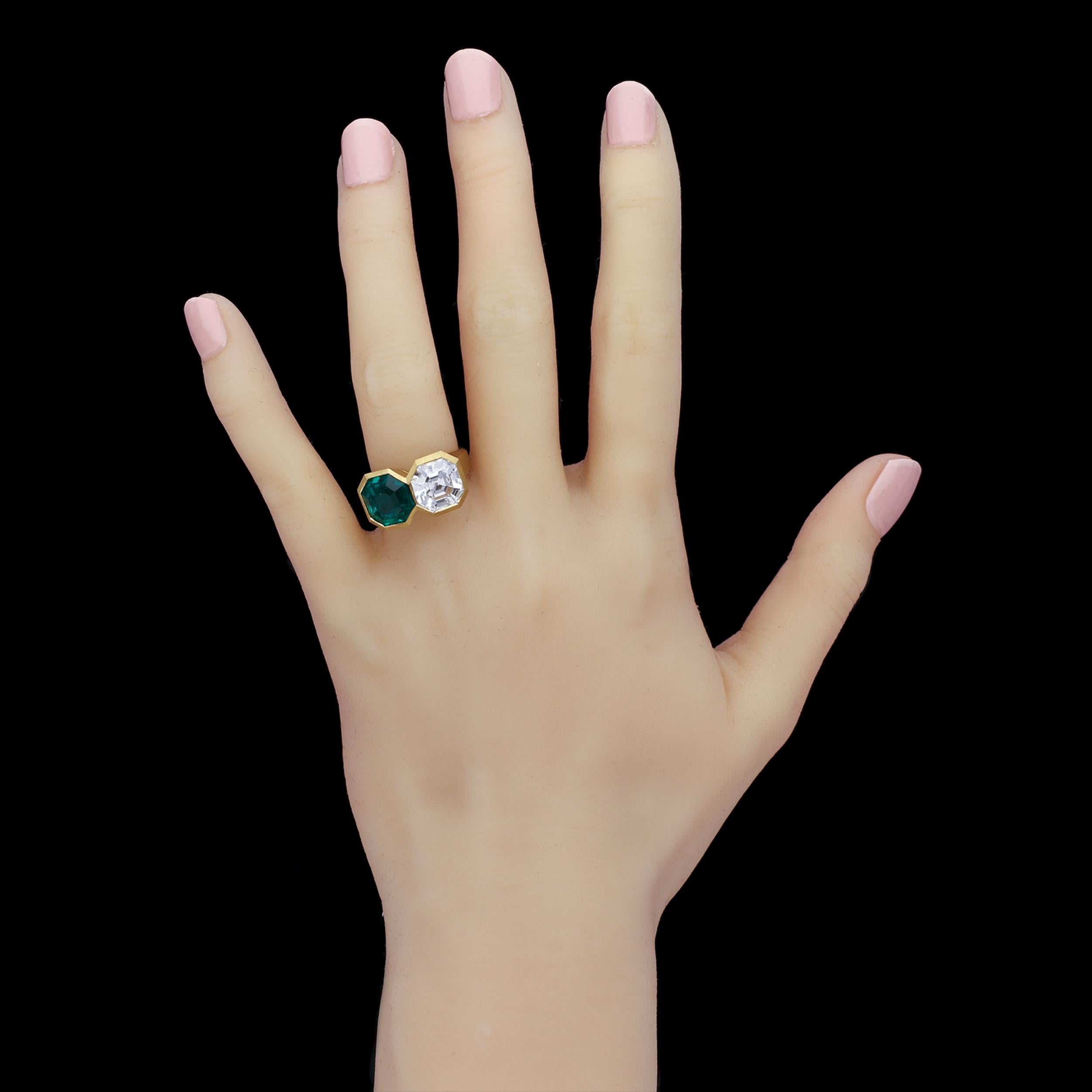 emerald and diamond two stone ring