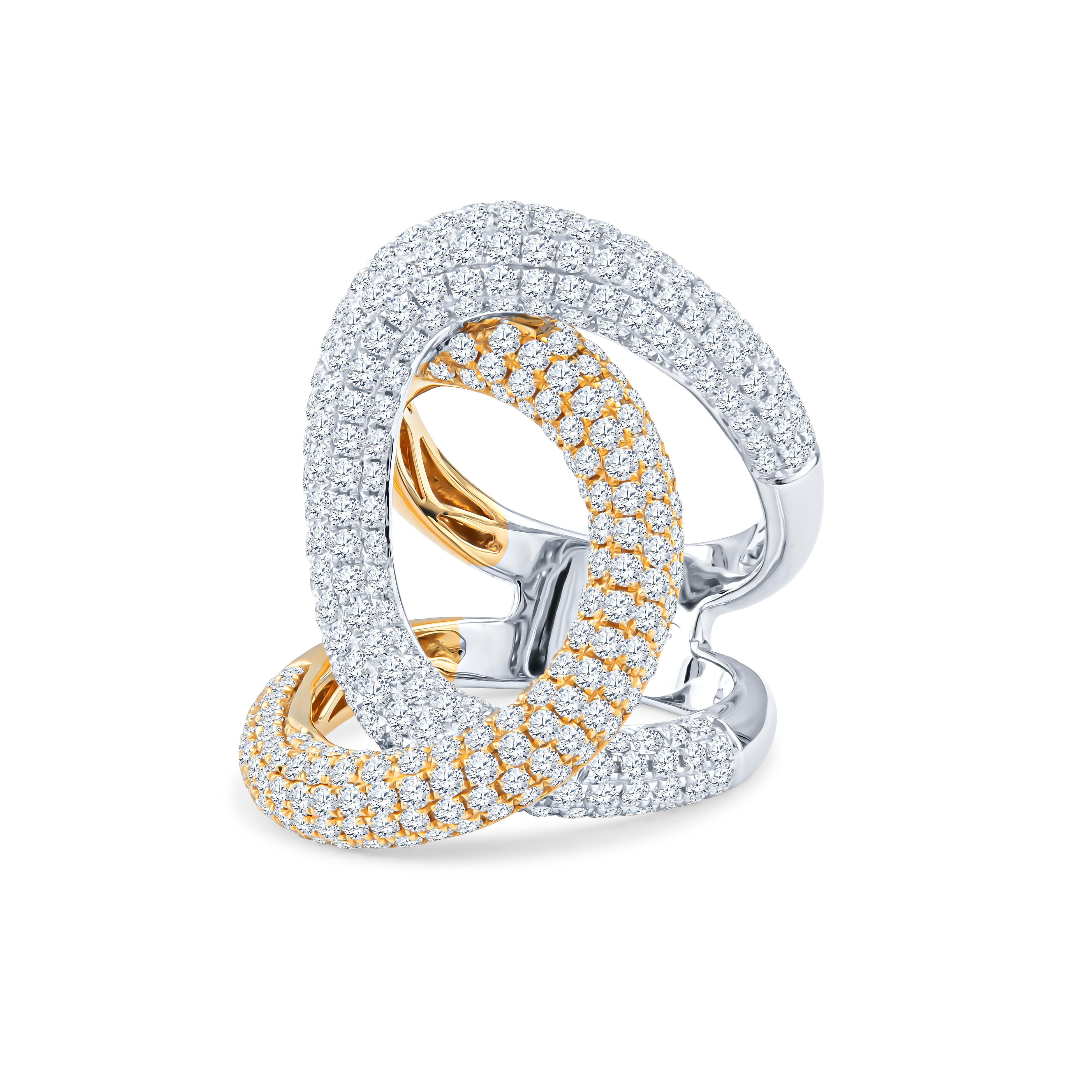This incredible ring is a swirl of 18kt white and yellow gold, covered in glittering 3.70ct round pave diamonds. The ring is a size 6.5, but it can be resized upon request.