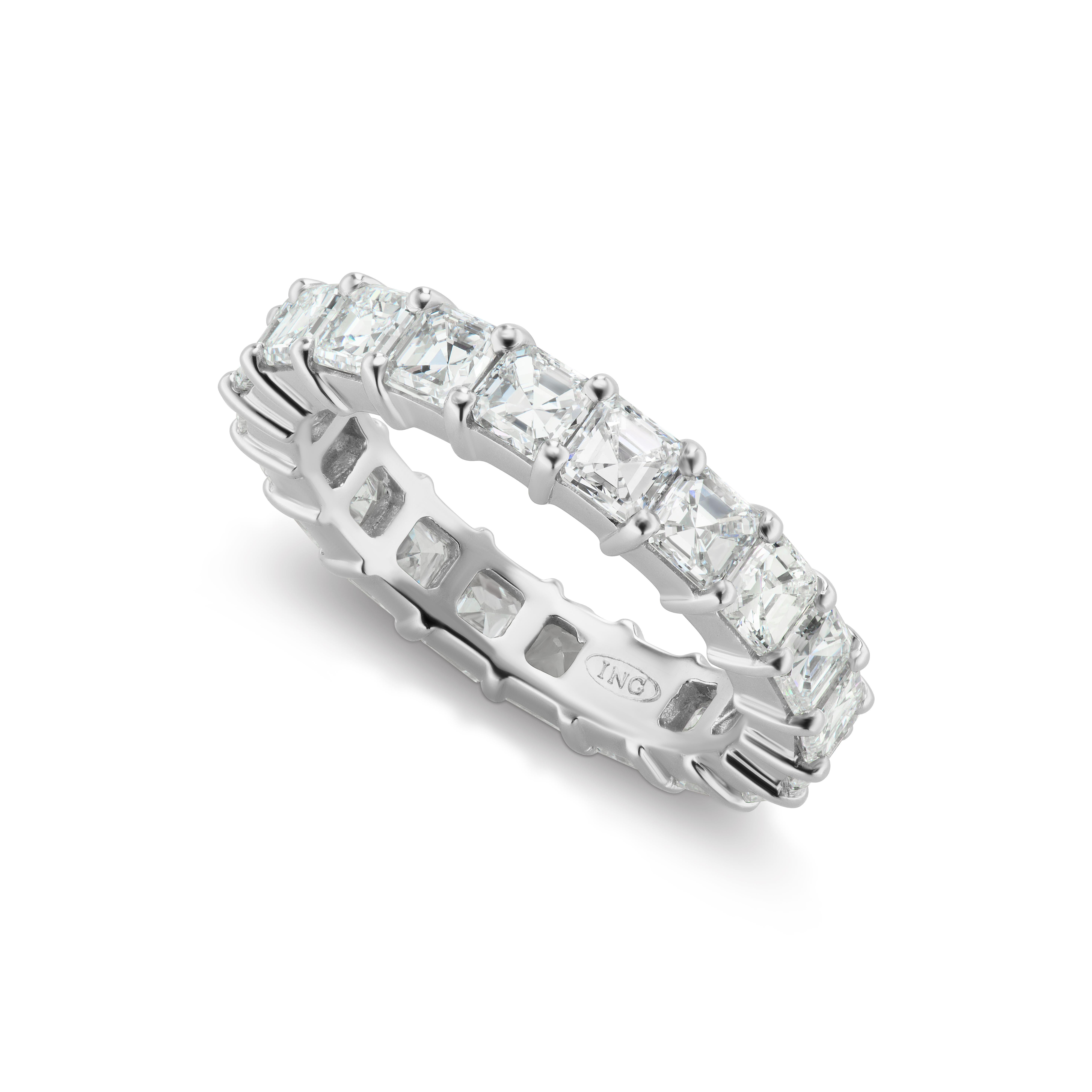 This stunning Asscher Cut diamond eternity band holds 20 stones F color VS quality weight 3.71 ct. total weight. It is Platinum in a size 6.
Not your size? Not a problem! We can easily make another to fit your finger. If you don't see something, say
