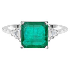 3.71 TCW Natural Emerald-Cut Emerald Three-Stone Ring 18k White Gold