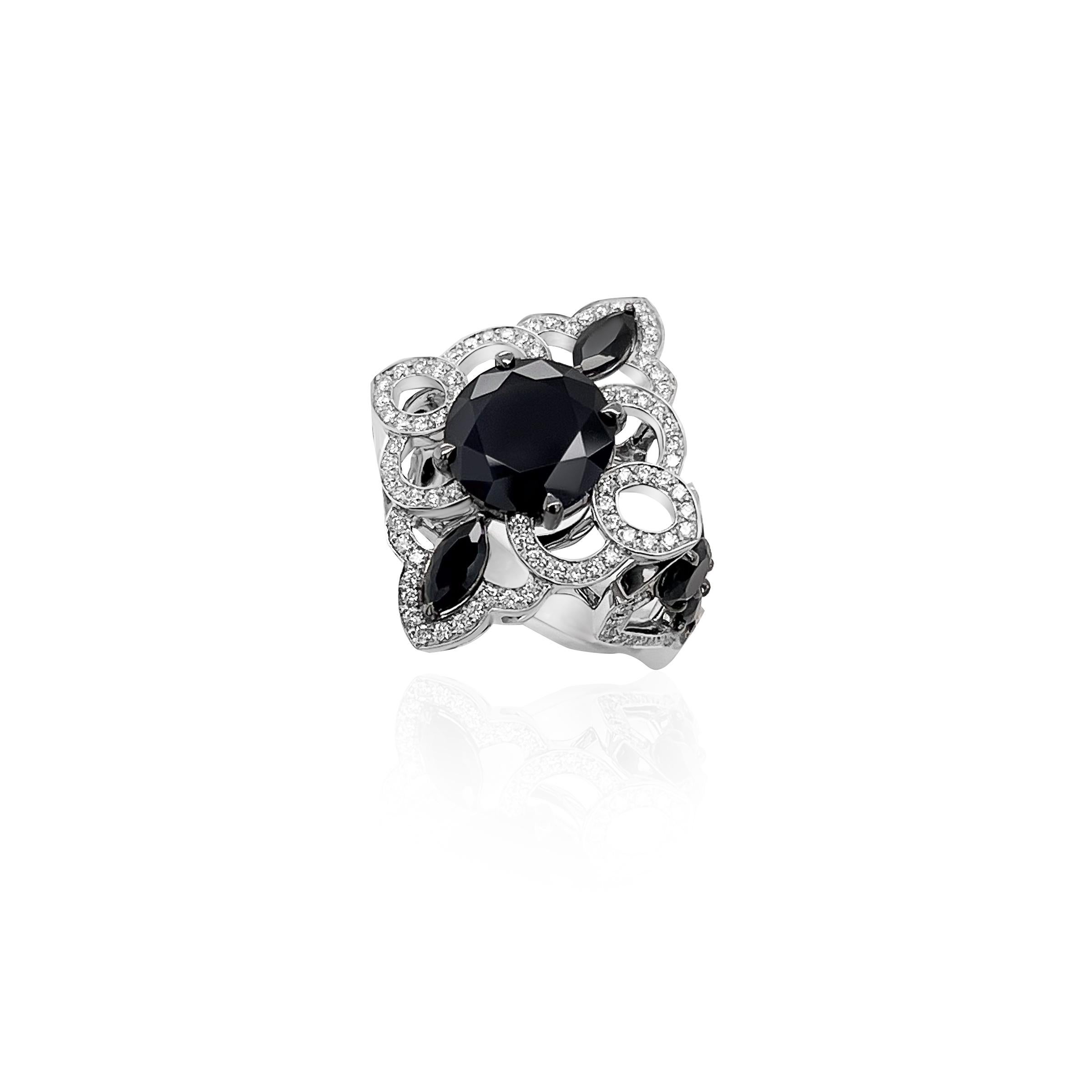 This exquisite ring is crafted with meticulous attention to detail, inspired by the glamour and precision characteristic of the Art Deco era.

At the heart of this ring lie the captivating black spinel center stone weighing 3.720 carats. Surrounding