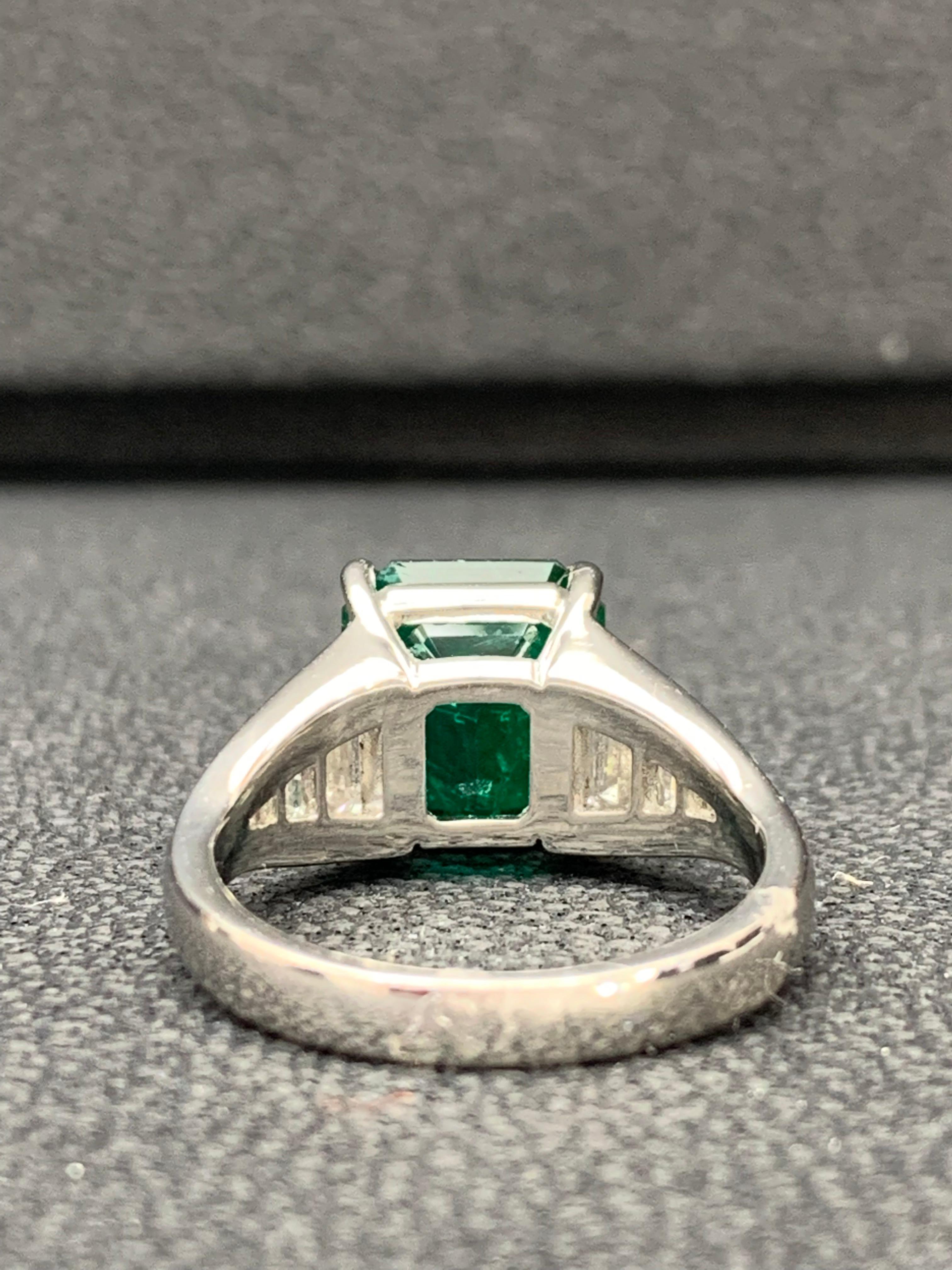 3.72 Carat Emerald Cut Emerald and Diamond Engagement Ring in Platinum In New Condition For Sale In NEW YORK, NY