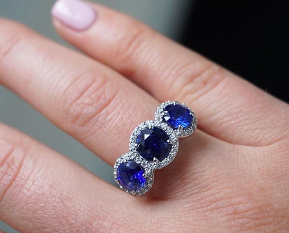 Sapphire Weight: 3.72 CT, Sapphire Measurements: 6-7 mm, Diamond Weight: 0.34 CT 1.3 mm, Metal: 18K White Gold/5.89 gm, Ring Size: 6.5, Shape: Round, Color: Blue, Hardness: 9, Birthstone: September