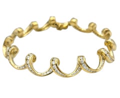 3.72 Carats Total Channel Set Diamond Coil Bracelet in 18 Karat Yellow Gold