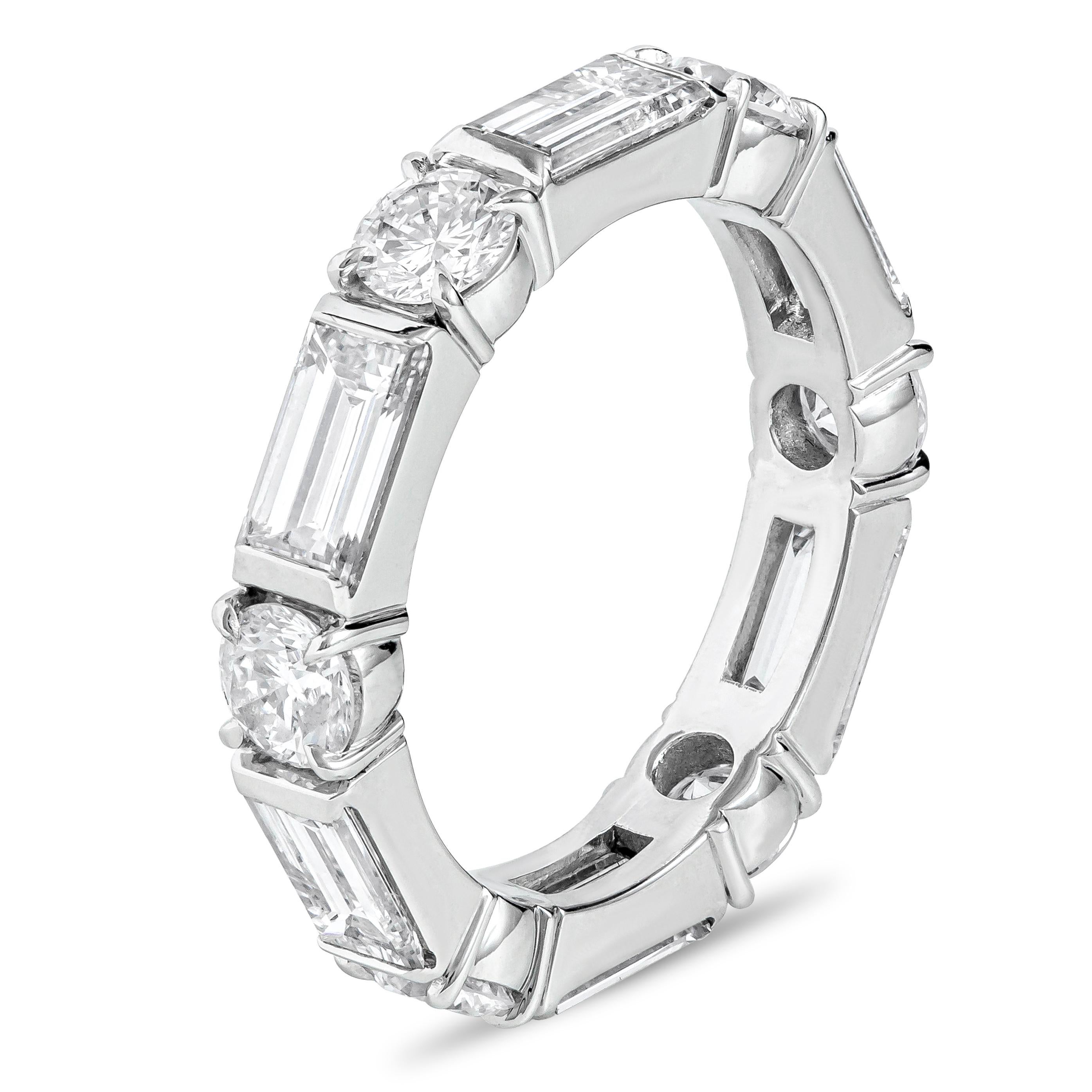 A classic eternity wedding band ring showcases alternating round and baguette diamonds. Round diamonds weigh 1.33 carats and baguette diamonds weigh 2.39 carats, G-H Color and VS-VVS in Clarity. Set in a bar and prongs setting, Made with Platinum,