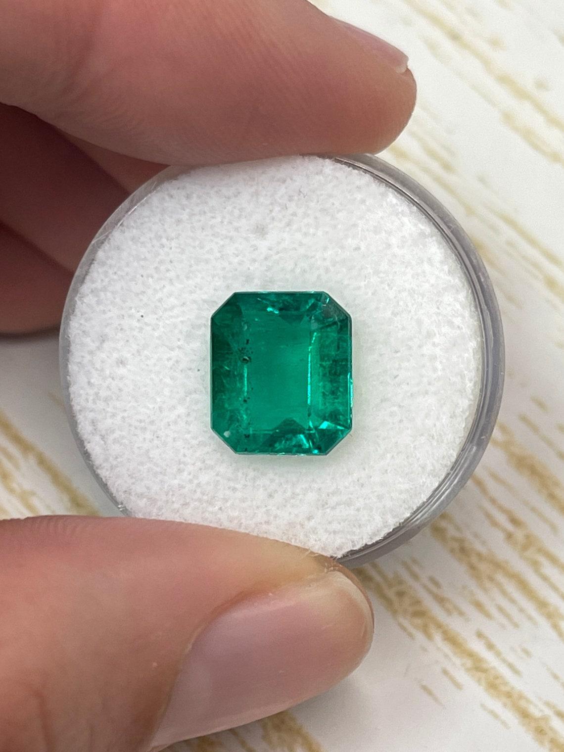 Stone: Emerald
Weight: 3.72-carats
Shape: Emerald Cut
Clarity: Transparent
Luster: Excellent
Color: Ideal Vivid Muzo Green
Measurements: 10.69mm x 9.27mm x 5.43mm
Geographic Origin: Colombia
Treatment: Natural, Oiling

Comments: Due to their growth