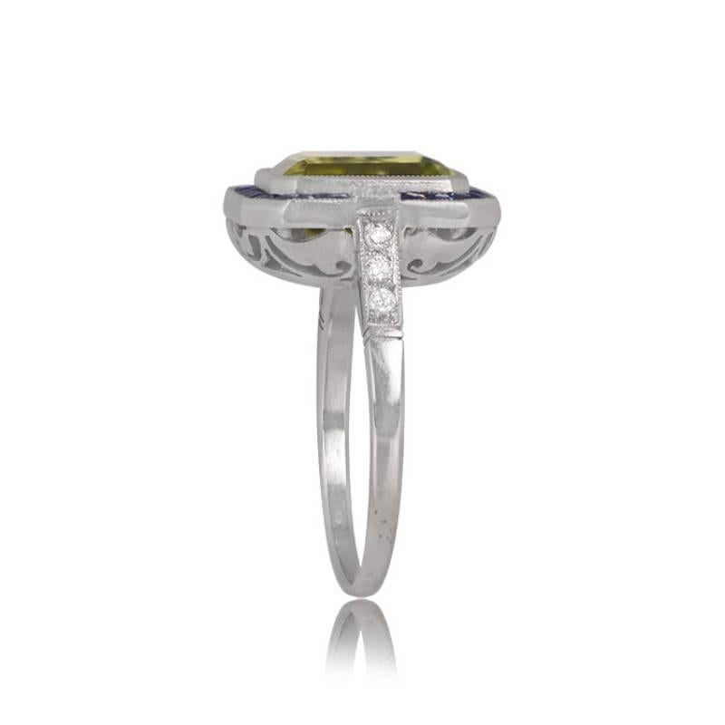3.72ct Emerald Cut Peridot Cocktail Ring, Sapphire Halo, Platinum In Excellent Condition For Sale In New York, NY
