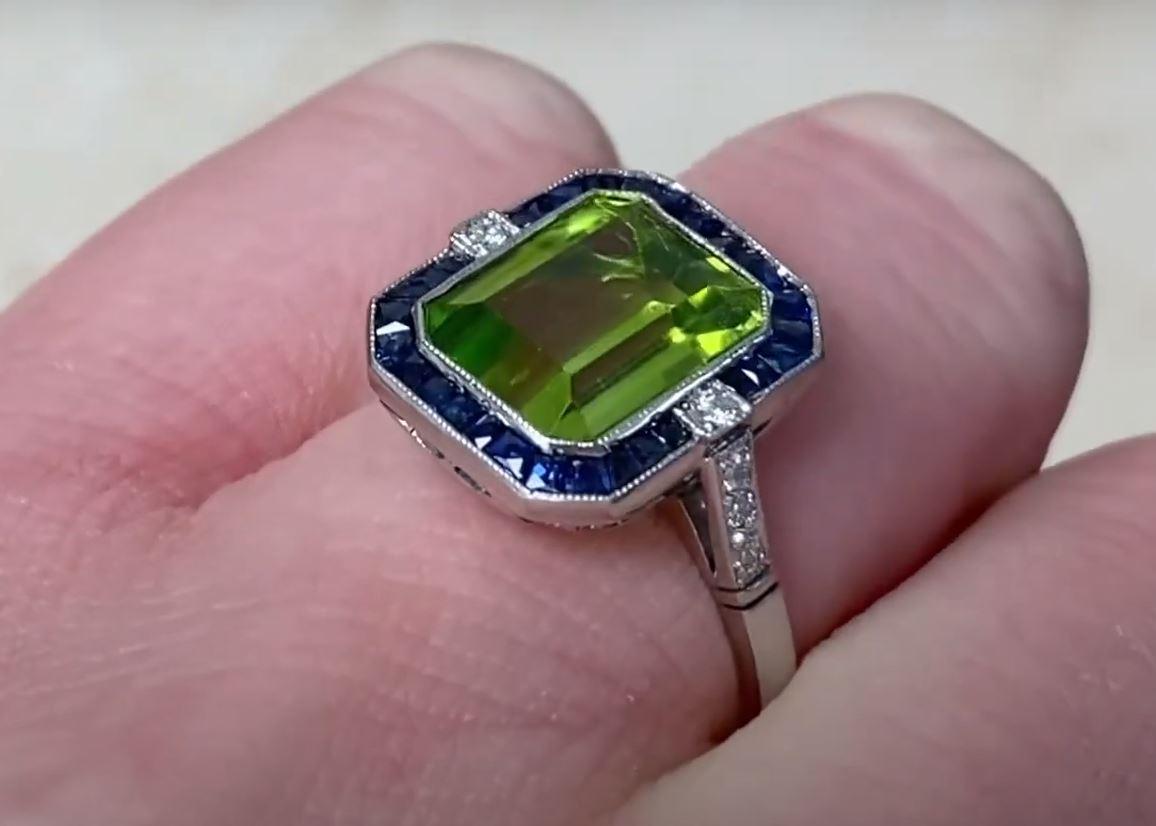 3.72ct Emerald Cut Peridot Cocktail Ring, Sapphire Halo, Platinum For Sale 2