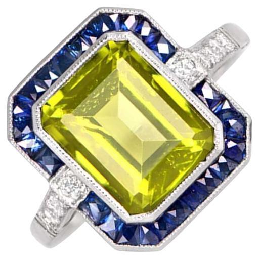 3.72ct Emerald Cut Peridot Cocktail Ring, Sapphire Halo, Platinum For Sale