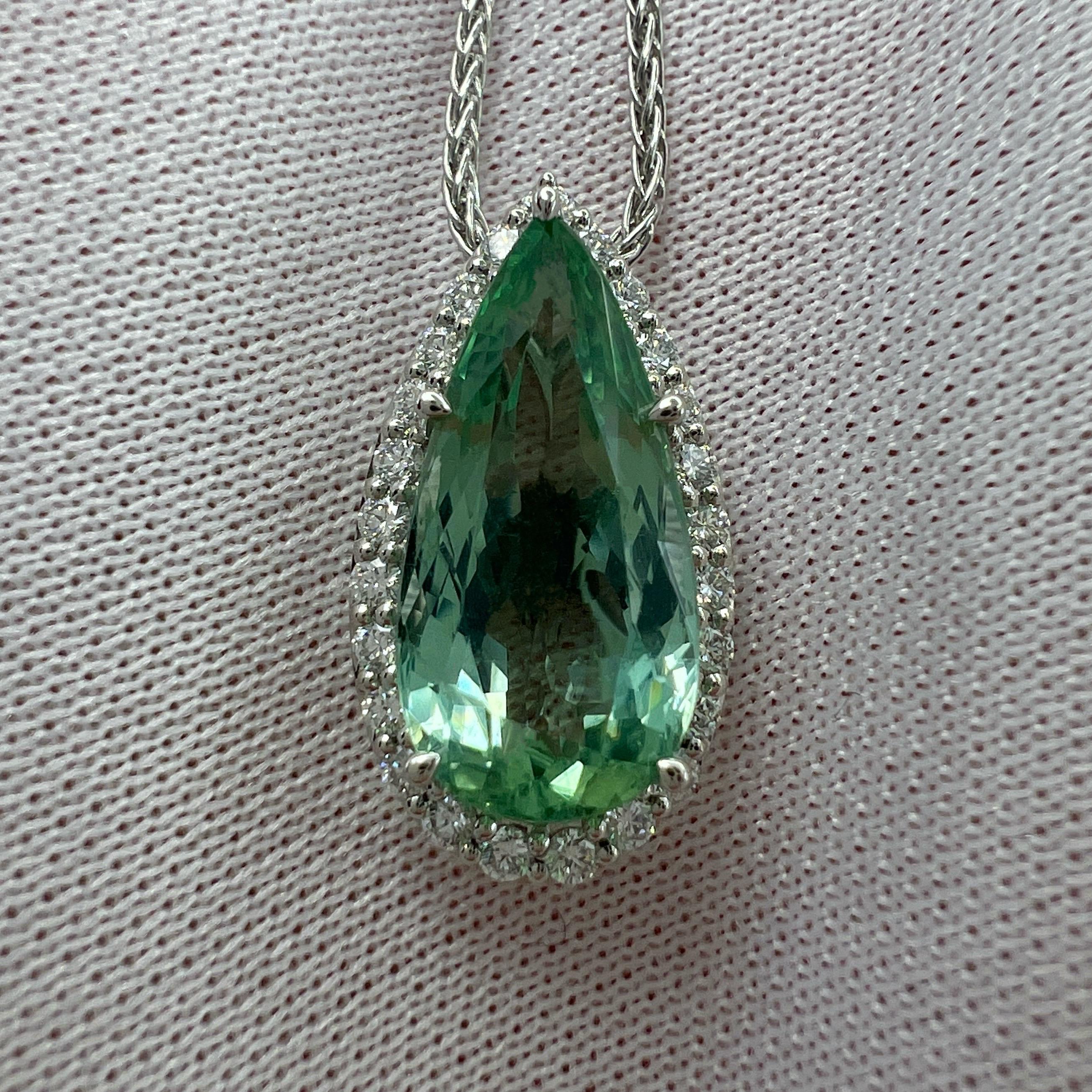 Fine Natural Pear Cut Vivid Green Tourmaline & Diamond Platinum Halo Pendant Necklace.

3.72 Carat tourmaline with a stunning vivid 'mint' green colour and excellent clarity, very clean stone. 
Also has an excellent pear teardrop cut showing lots of