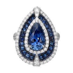 Bague en or blanc 18 carats avec diamants et saphirs bleus poire de 3,73 carats