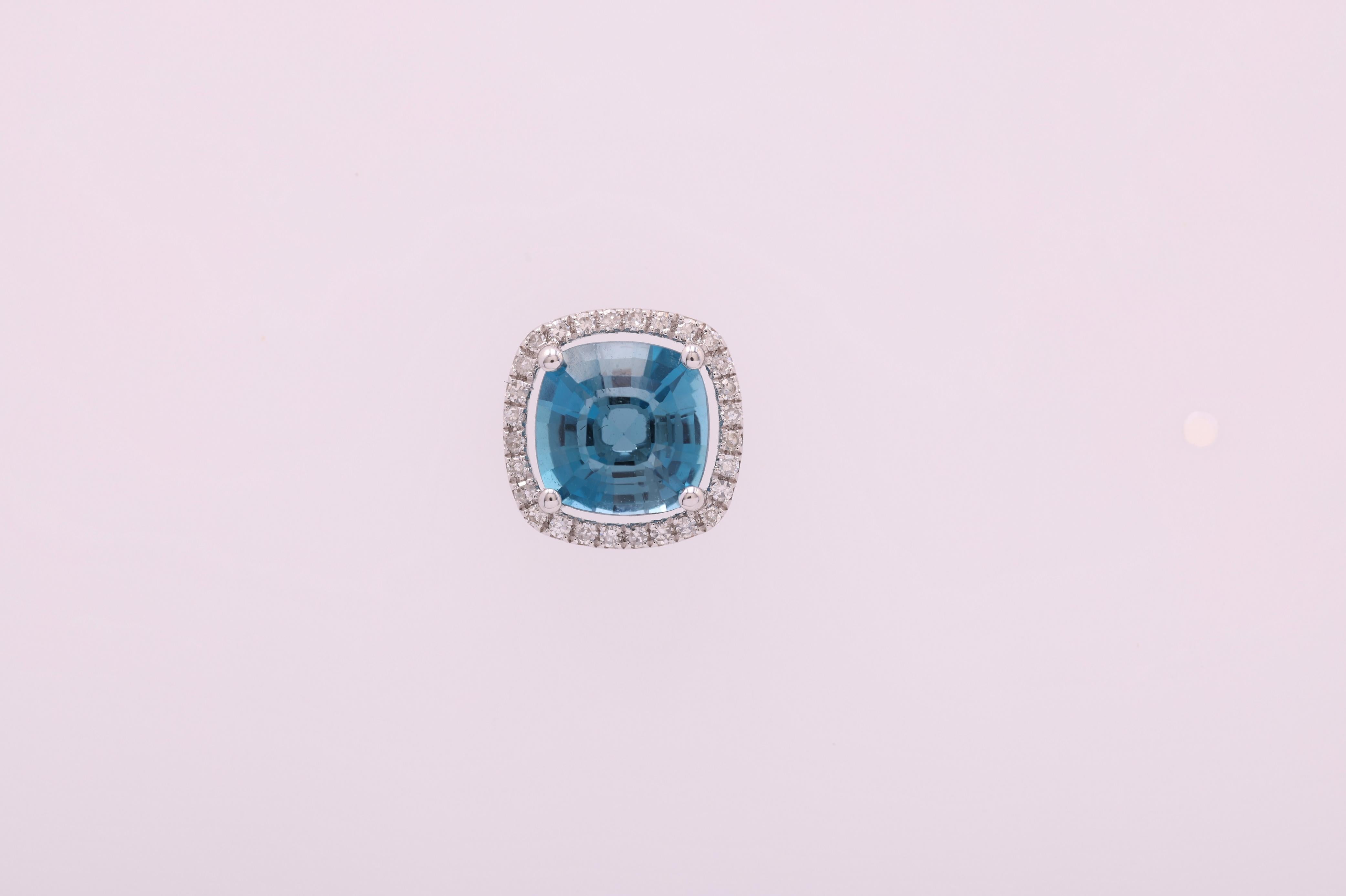 Contemporary 3.73 Carat London Blue Topaz and Diamond Halo Stud Earrings in 14W ref1130 For Sale