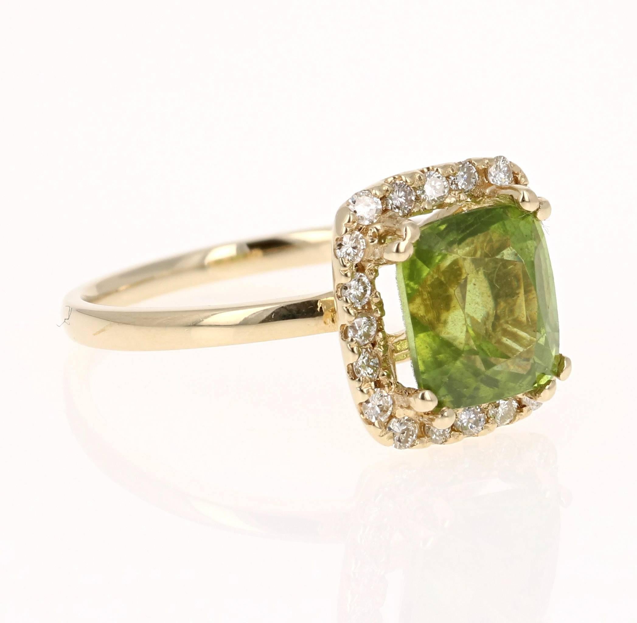 This beautiful ring has a Emerald Cut Peridot in the center that weighs 3.42 carats. The ring is surrounded by a gorgeous halo of 21 Round Cut Diamonds that weigh 0.31 carats. The total carat weight of the ring is 3.73 carats. The setting is crafted