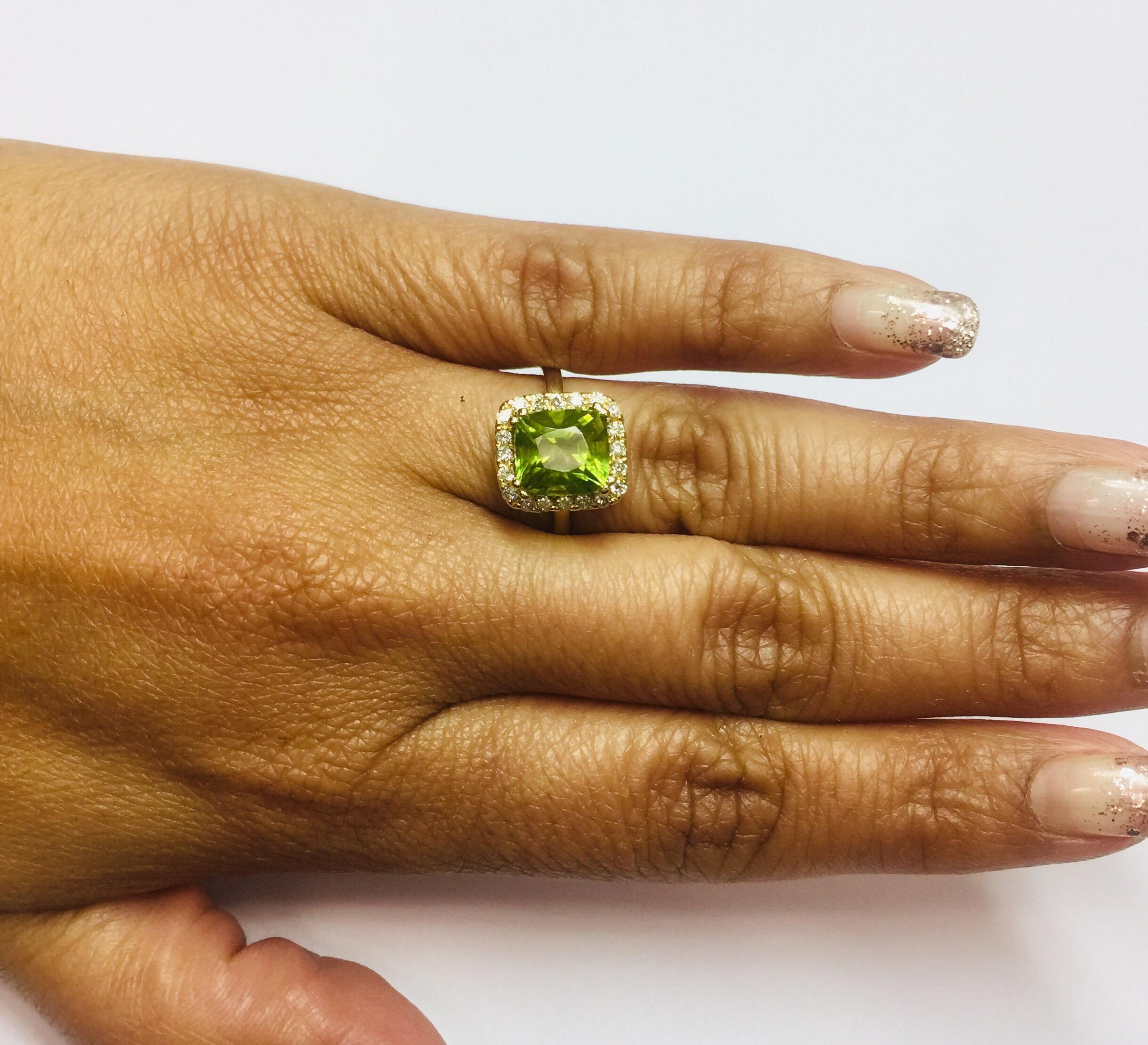 Emerald Cut 3.73 Carat Peridot Diamond 14 Karat Yellow Gold Cocktail Ring For Sale