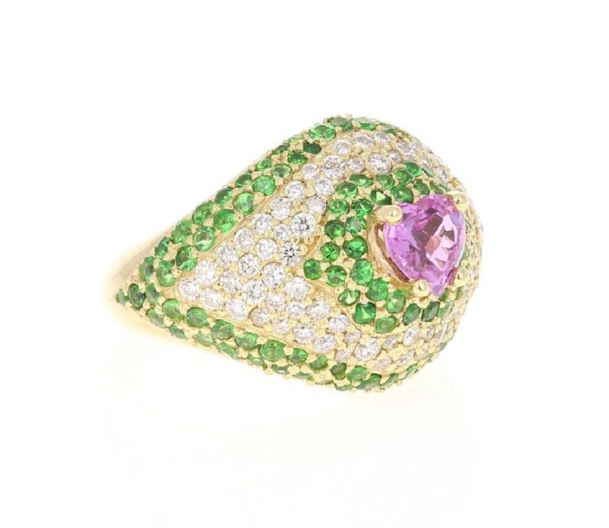 Beautiful and Unique Pink Sapphire, Tsavorite, & Diamond Ring!! 

This ring has a Heart Cut Pink Sapphire that weighs 0.93 Carats. 
The ring is embellished with 130 Tsavorites that weigh 1.85 Carats as well as 78 Round Cut Diamonds that weigh 0.95