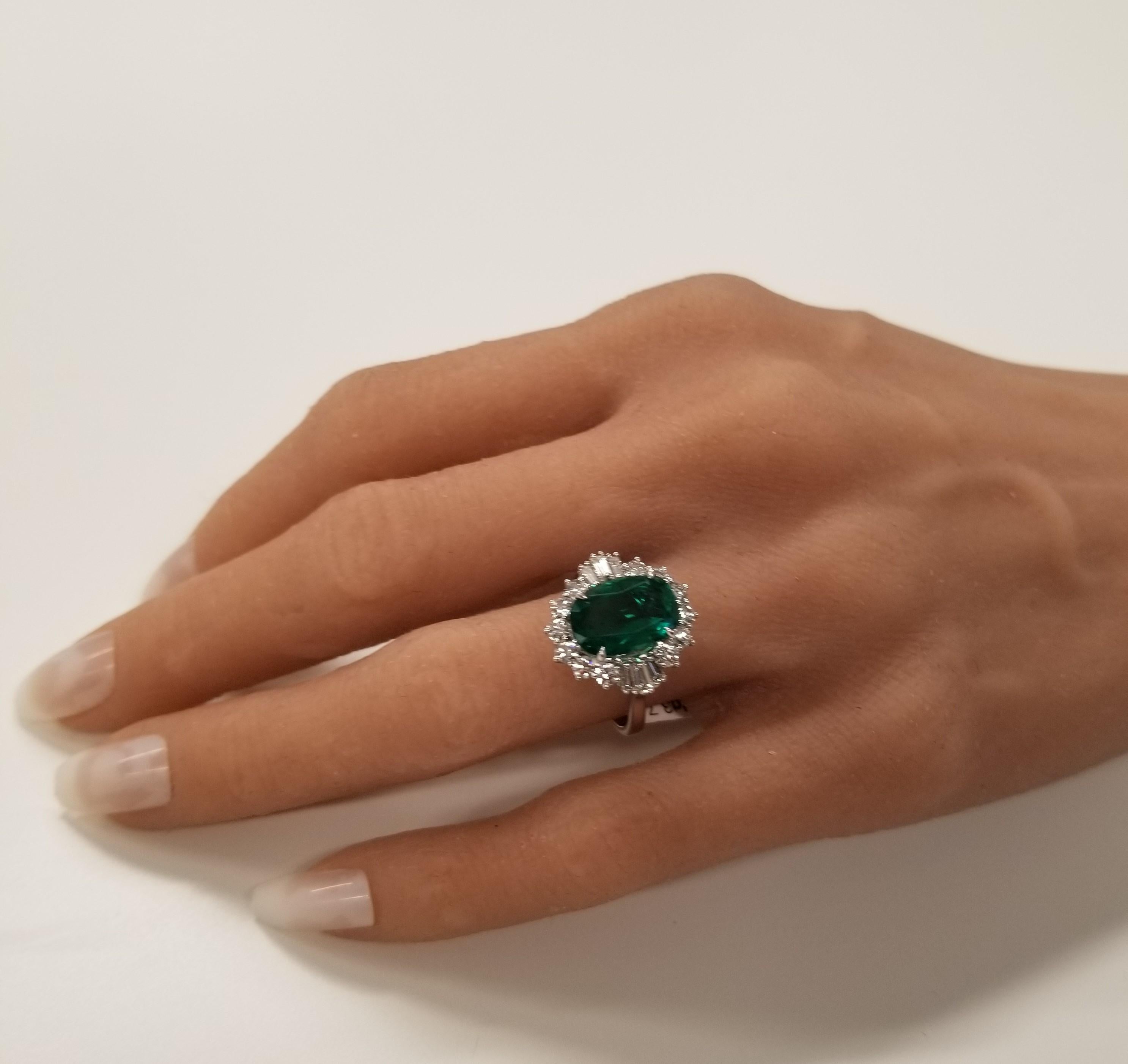 This is a vintage style ring that will make you feel like a princess. This stunning 3.74 carat emerald has the attributes of the top-end gem. Its clarity & transparency are excellent. Its origin is Brazil. Measuring 12.00 x 8.21 mm, it is vibrant